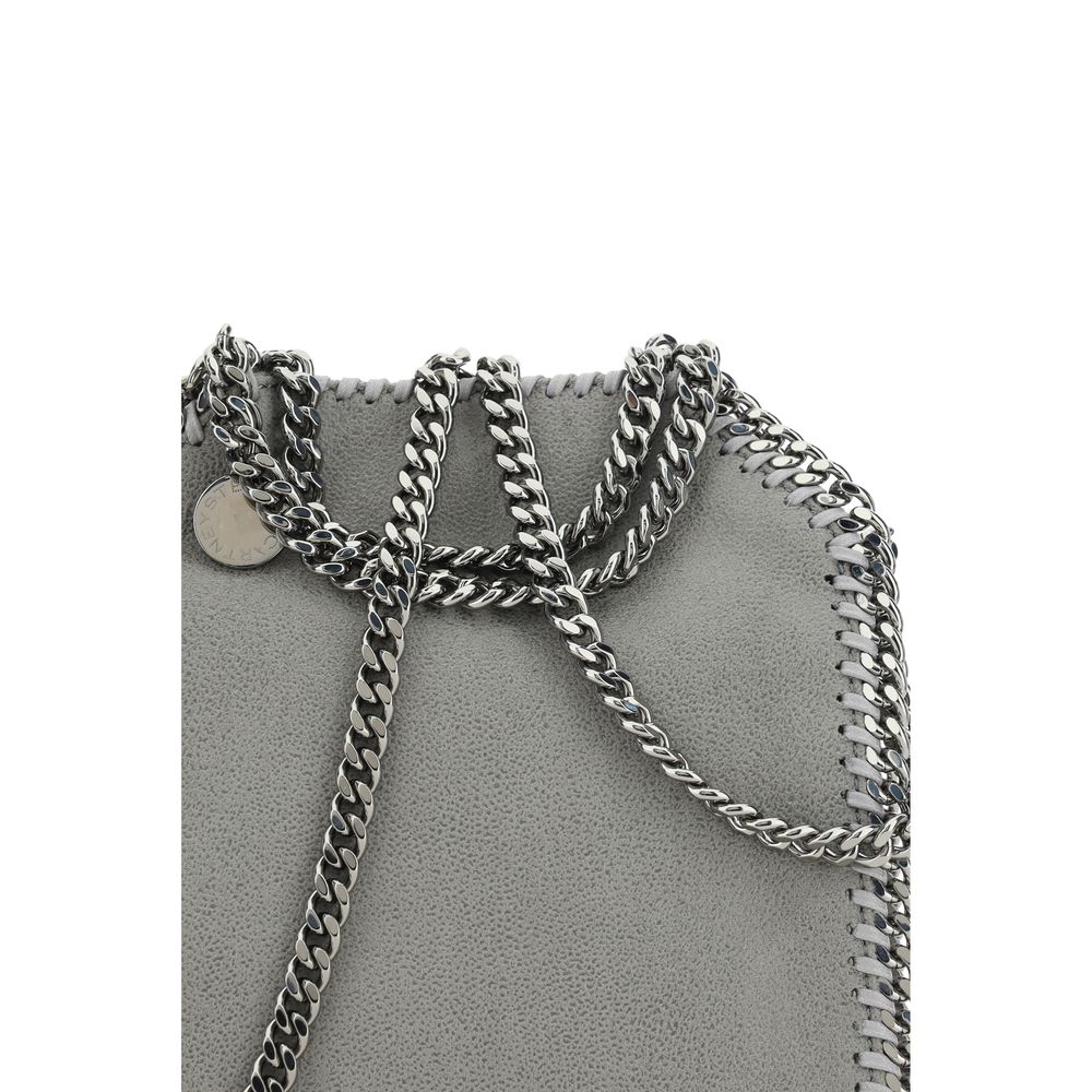 Elevate your style with the Stella McCartney Tiny Shaggy Handbag, a sustainable luxury piece crafted in iconic faux leather, perfect for the discerning modern individual.