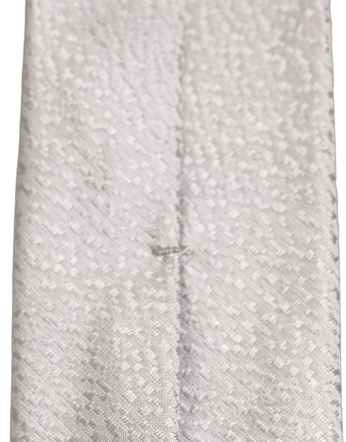 Elevate your elegance with the Dolce & Gabbana Gray Silk Necktie, a masterpiece of Italian craftsmanship that embodies sophistication and timeless luxury for the discerning individual.