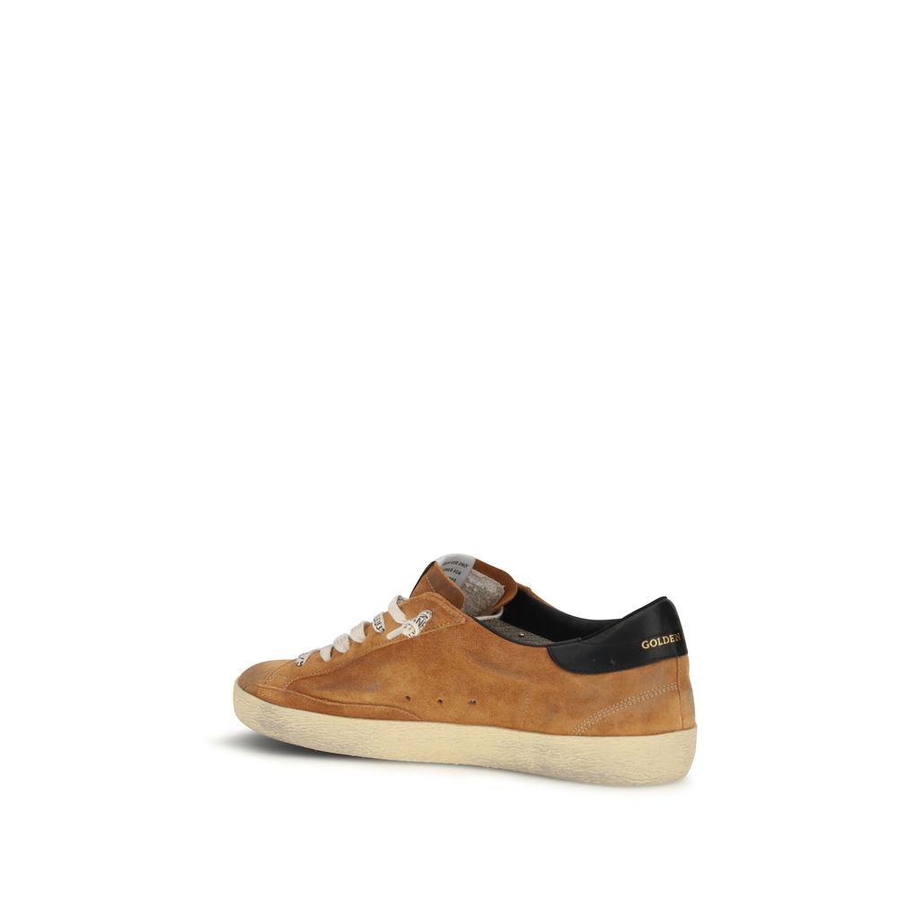 Elevate your style with Golden Goose Brown Calf Leather Bos Taurus Low Top Sneakers, where exquisite craftsmanship meets a vintage-inspired aesthetic for the discerning individual.
