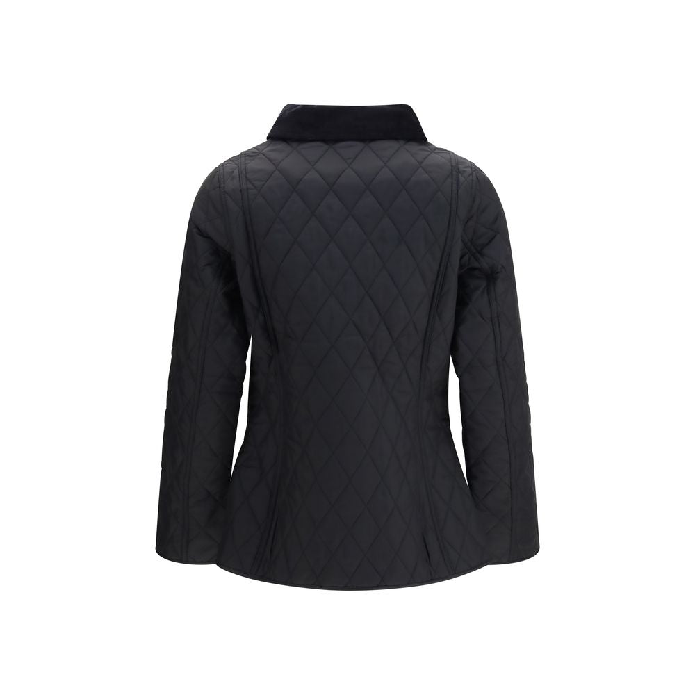 Discover the Barbour Blue Polyamide Shell Jacket, a masterful blend of elegance and functionality, featuring iconic diamond quilting and a luxurious silhouette for timeless sophistication.