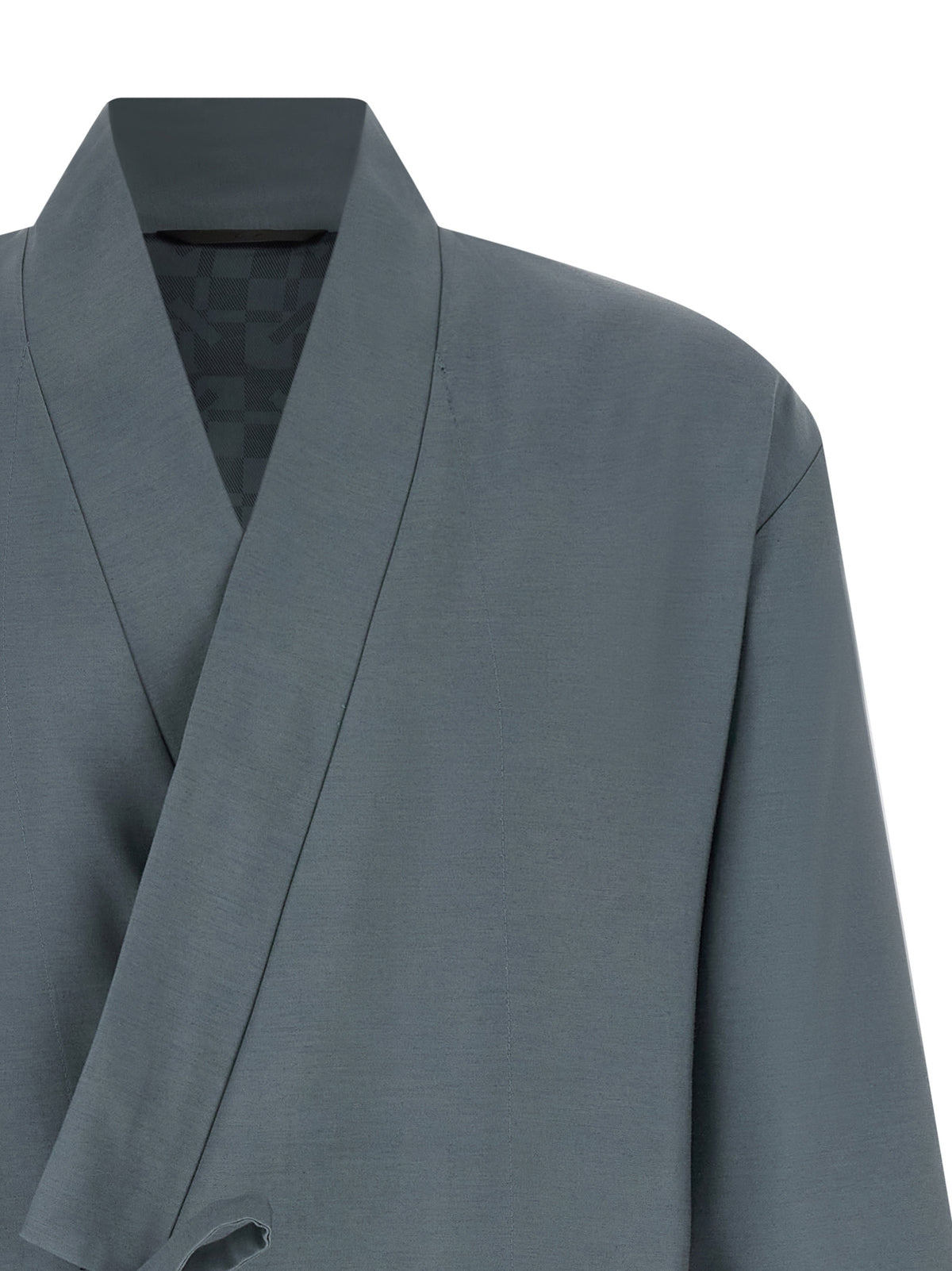 Elevate your wardrobe with the Kenzo Gray Wool Blazer, a masterpiece of deconstructed elegance in a luxurious viscose-wool blend, perfect for the discerning individual.