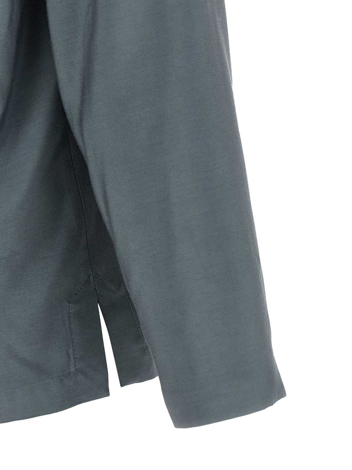 Indulge in the Kenzo Gray Wool Blazer, a masterpiece of deconstructed elegance crafted from a luxurious viscose-wool blend, elevating your wardrobe with refined sophistication.