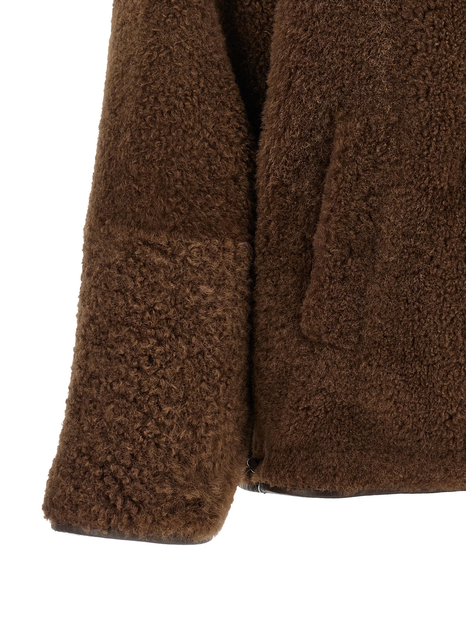 Indulge in the exquisite Brunello Cucinelli Brown Lamb Leather Biker Jacket, a reversible masterpiece of pure shearling that embodies luxury and sophistication for the discerning individual.