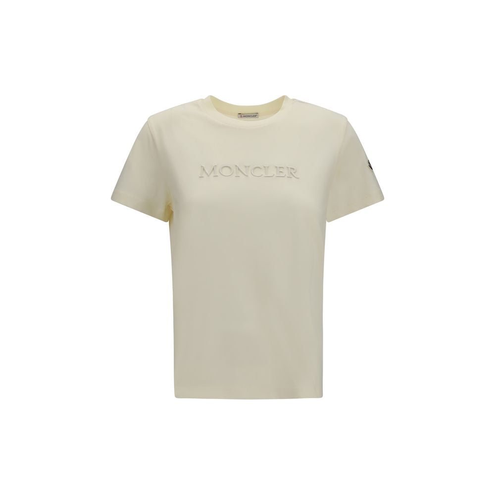 Discover the Moncler Beige Cotton T-Shirt from the AW26 collection, crafted from luxurious cotton for a timeless blend of elegance and comfort, perfect for any discerning wardrobe.