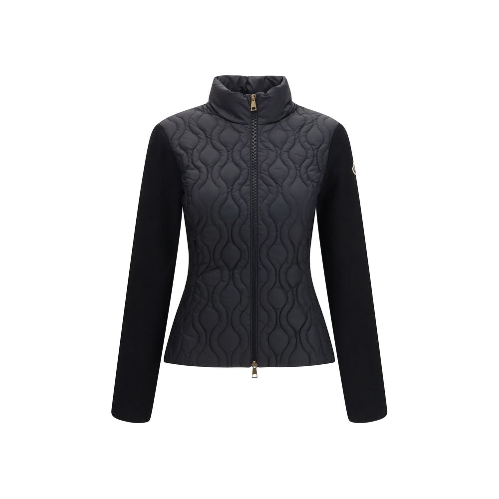 Discover the Moncler Black Cotton Shell Jacket, a masterpiece of luxury and functionality, crafted from 100% cotton to elevate your outerwear collection with timeless elegance.
