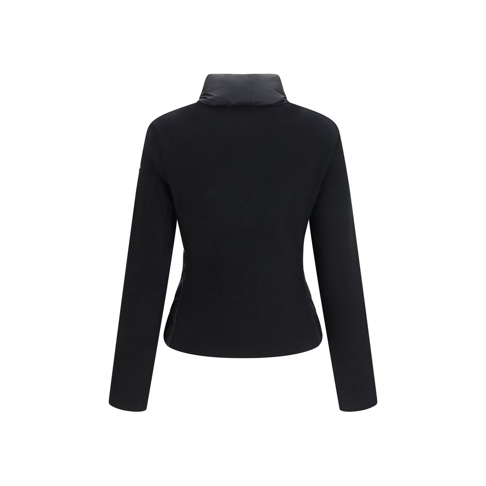 Indulge in the Moncler Black Cotton Shell Jacket, a masterpiece of craftsmanship in 100% cotton, blending warmth and elegance for the discerning individual.