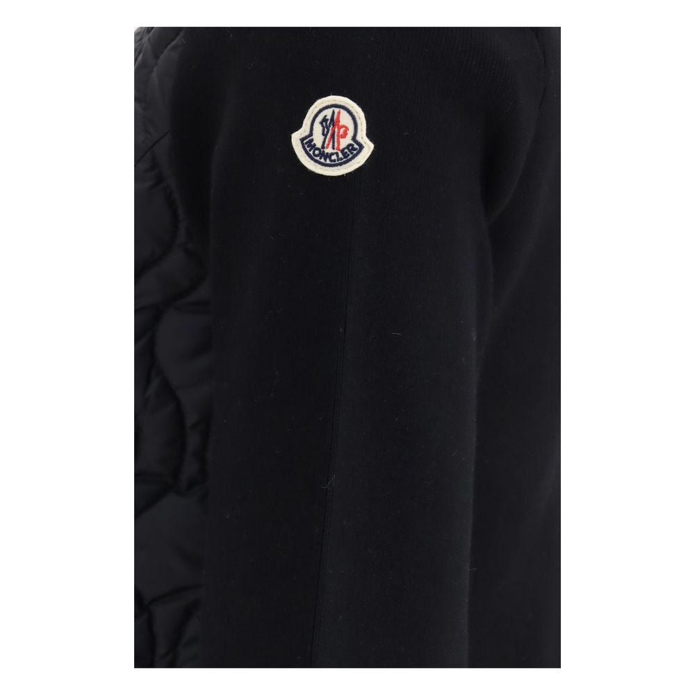Discover the Moncler Black Cotton Shell Jacket, a masterpiece of luxury and style, crafted from 100% cotton with exquisite detailing for the discerning individual.