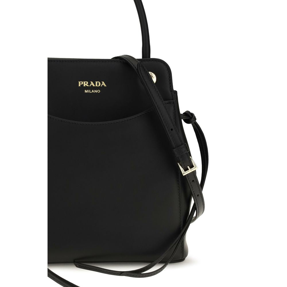 Discover the Prada Black Calf Leather Bos Taurus Shoulder Bag, a timeless blend of elegance and sophistication, crafted for those who embrace luxury and style.
