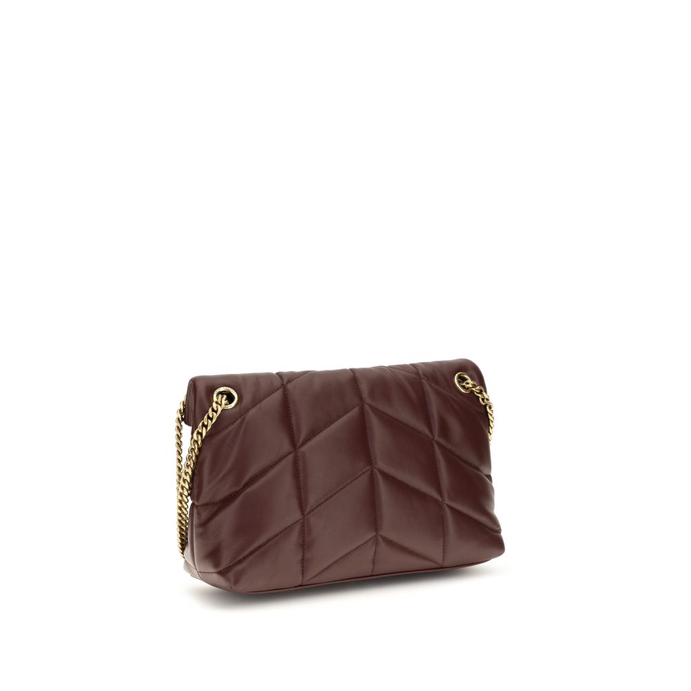 Indulge in the opulent allure of the Saint Laurent Bordeaux Lamb Leather Shoulder Bag, a timeless masterpiece of exquisite craftsmanship and refined elegance.