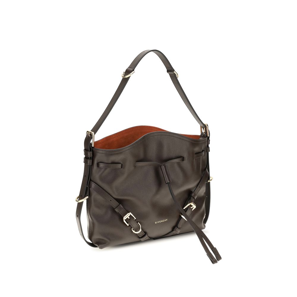 Discover the Givenchy Brown Calf Leather Bos Taurus Bucket Bag, a luxurious blend of exquisite craftsmanship and timeless elegance, perfect for the discerning individual.