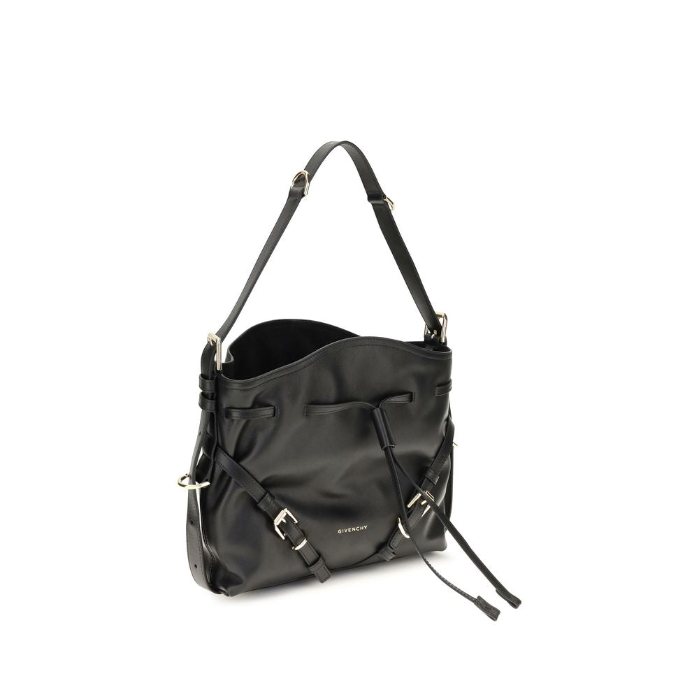 Discover the Givenchy Black Calf Leather Bos Taurus Bucket Bag, a masterpiece of luxury crafted from smooth calfskin, embodying elegance and sophistication for discerning tastes.