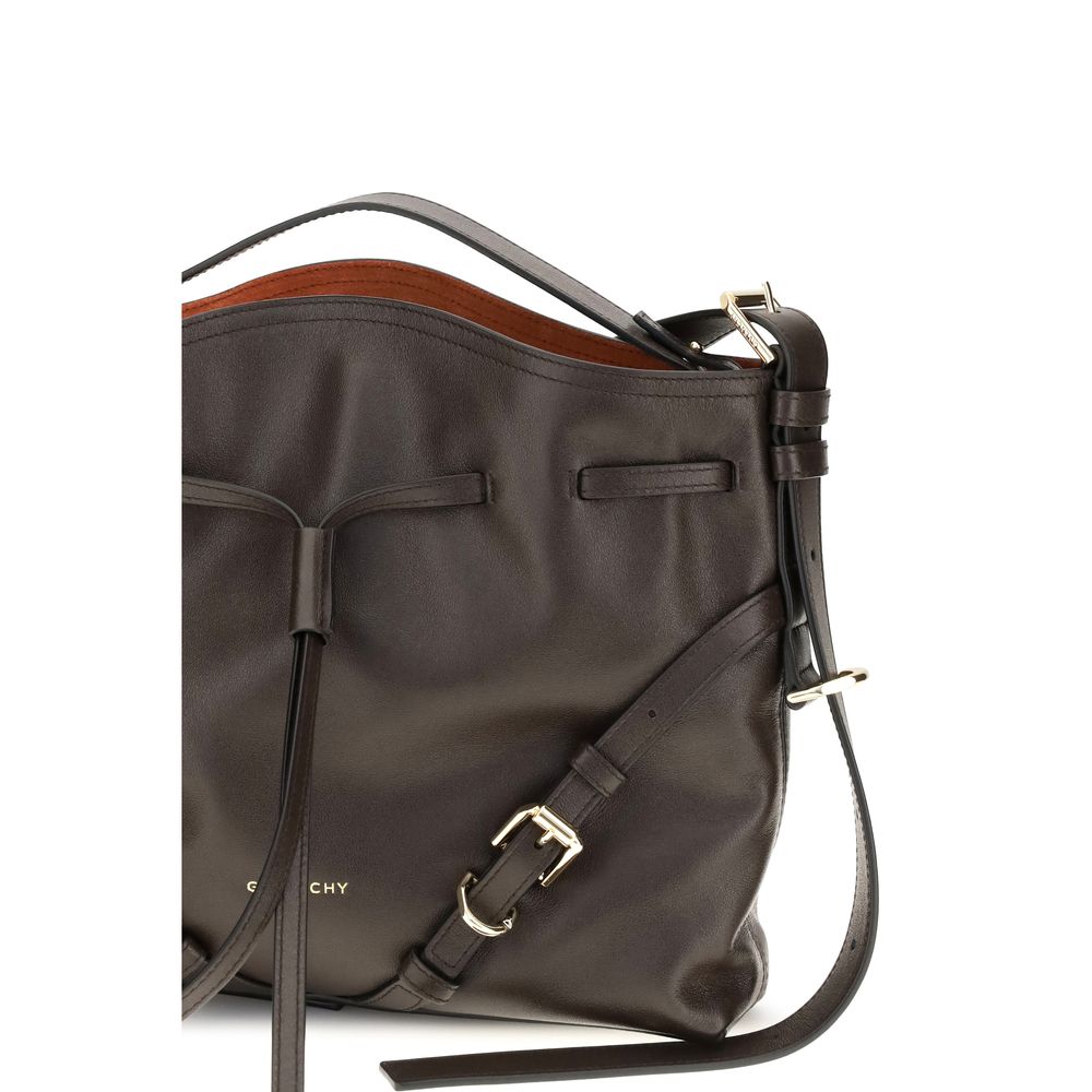 Indulge in the Givenchy Brown Calf Leather Bos Taurus Bucket Bag, a fusion of exquisite craftsmanship and modern elegance, perfect for the discerning individual.