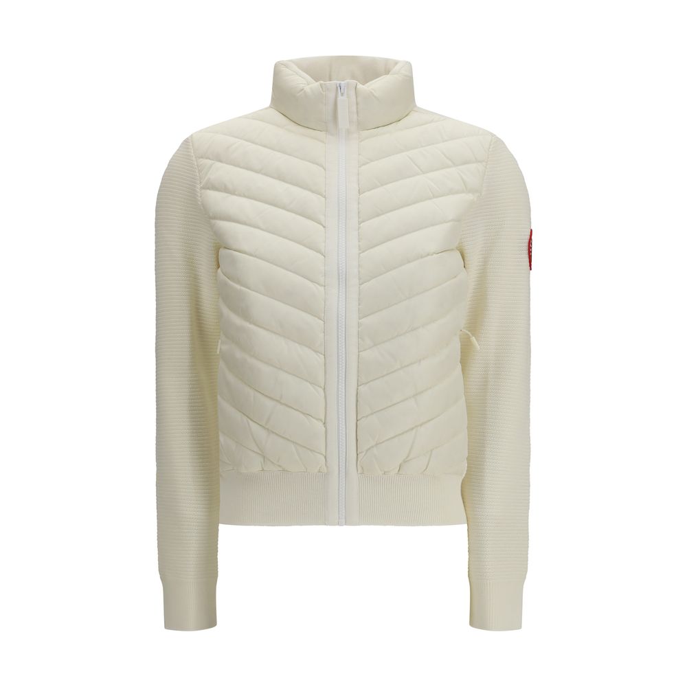 Indulge in the opulence of the Canada Goose Beige Wool Oves Aries Full-Length Jacket, where exquisite craftsmanship meets contemporary elegance for a timeless statement.