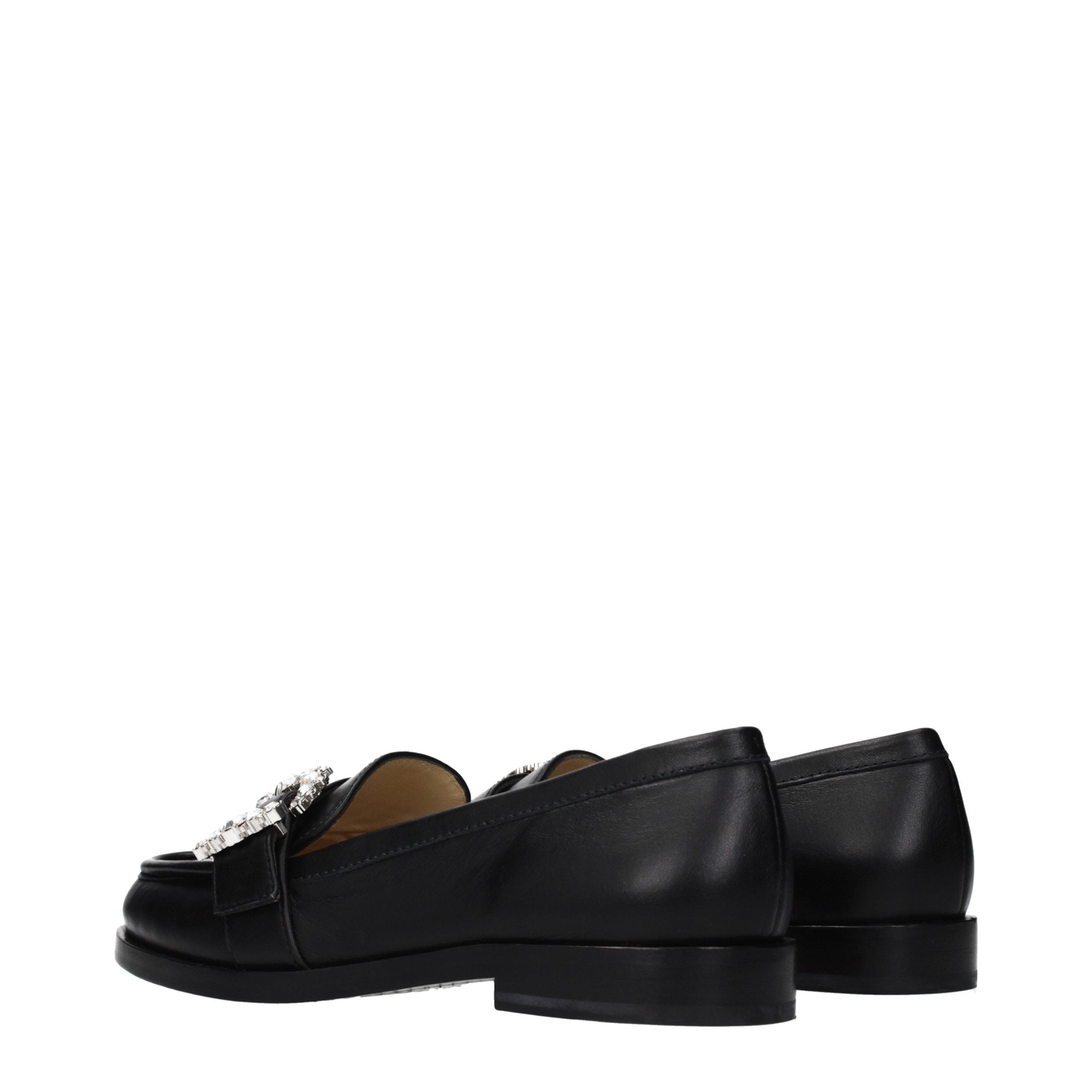 Indulge in the elegance of Jimmy Choo Black Leather Slip-On Loafers, where exquisite craftsmanship meets timeless style, perfect for the discerning connoisseur.