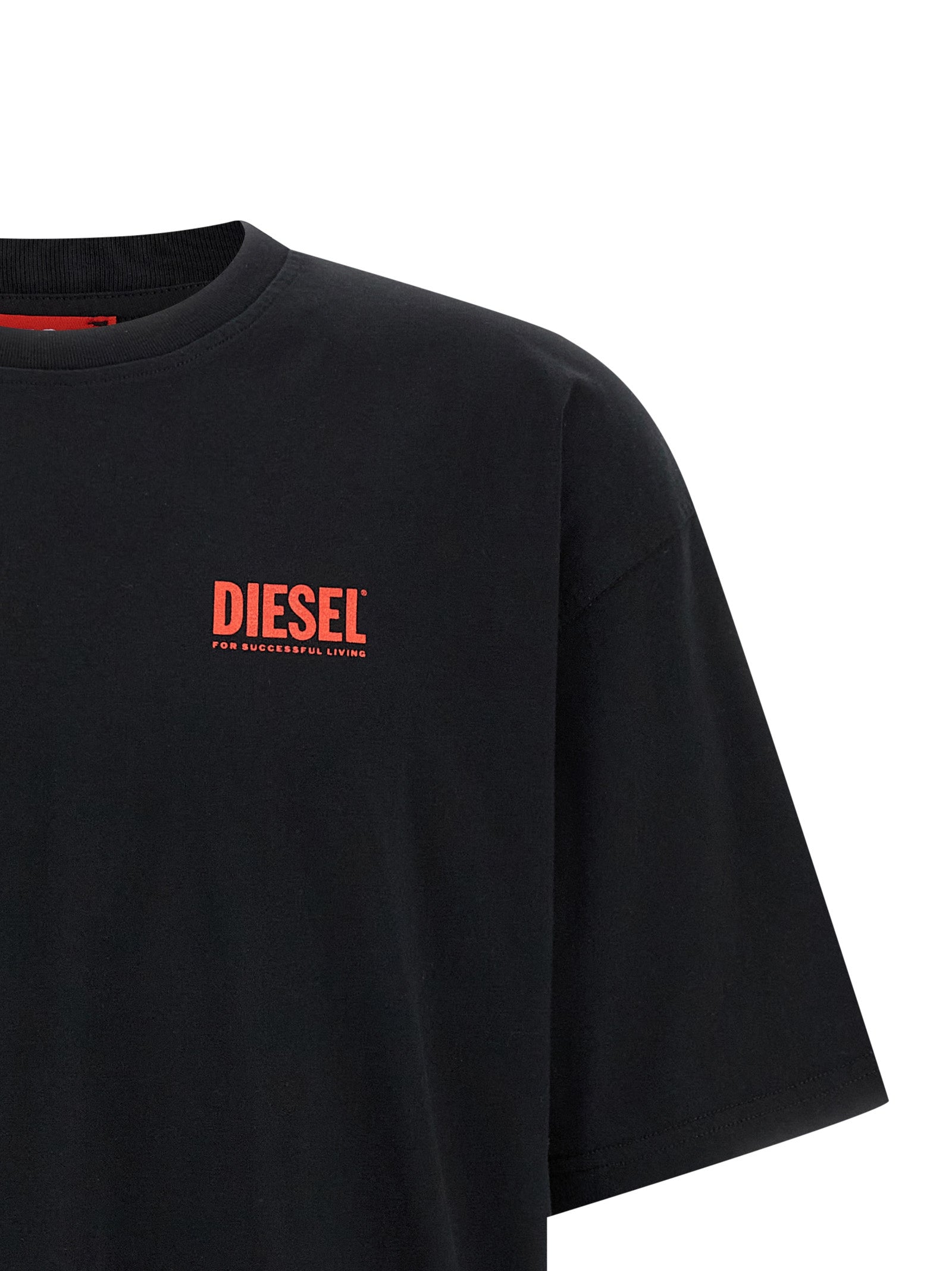 Elevate your style with the Diesel Black Cotton T-Shirt, a bold statement piece crafted from sustainable organic cotton, merging luxury and conscience effortlessly.