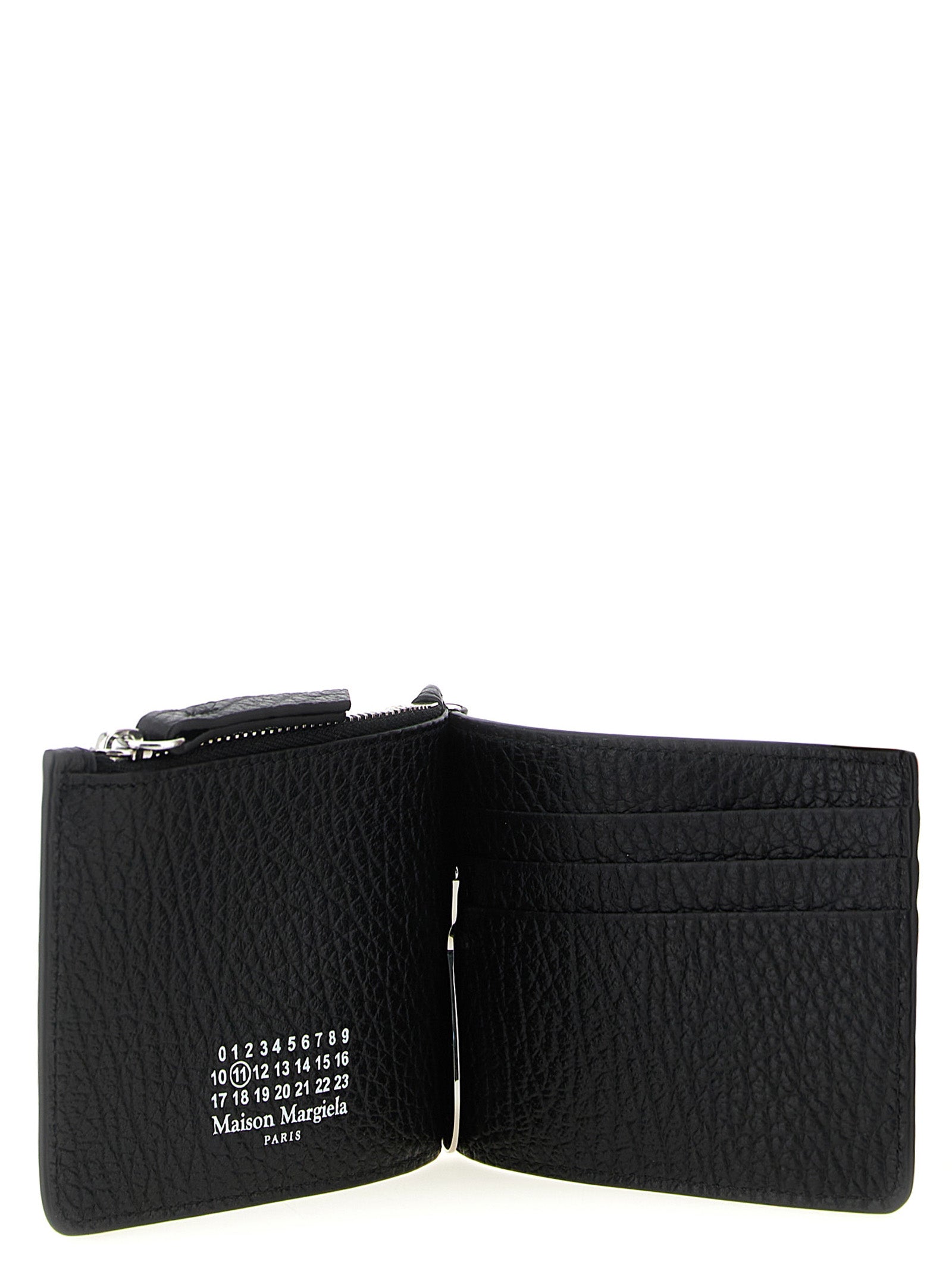 Indulge in the sophistication of the Maison Margiela Black Calfskin Leather Wallet, a masterful blend of exquisite craftsmanship and minimalist design, perfect for the discerning individual.