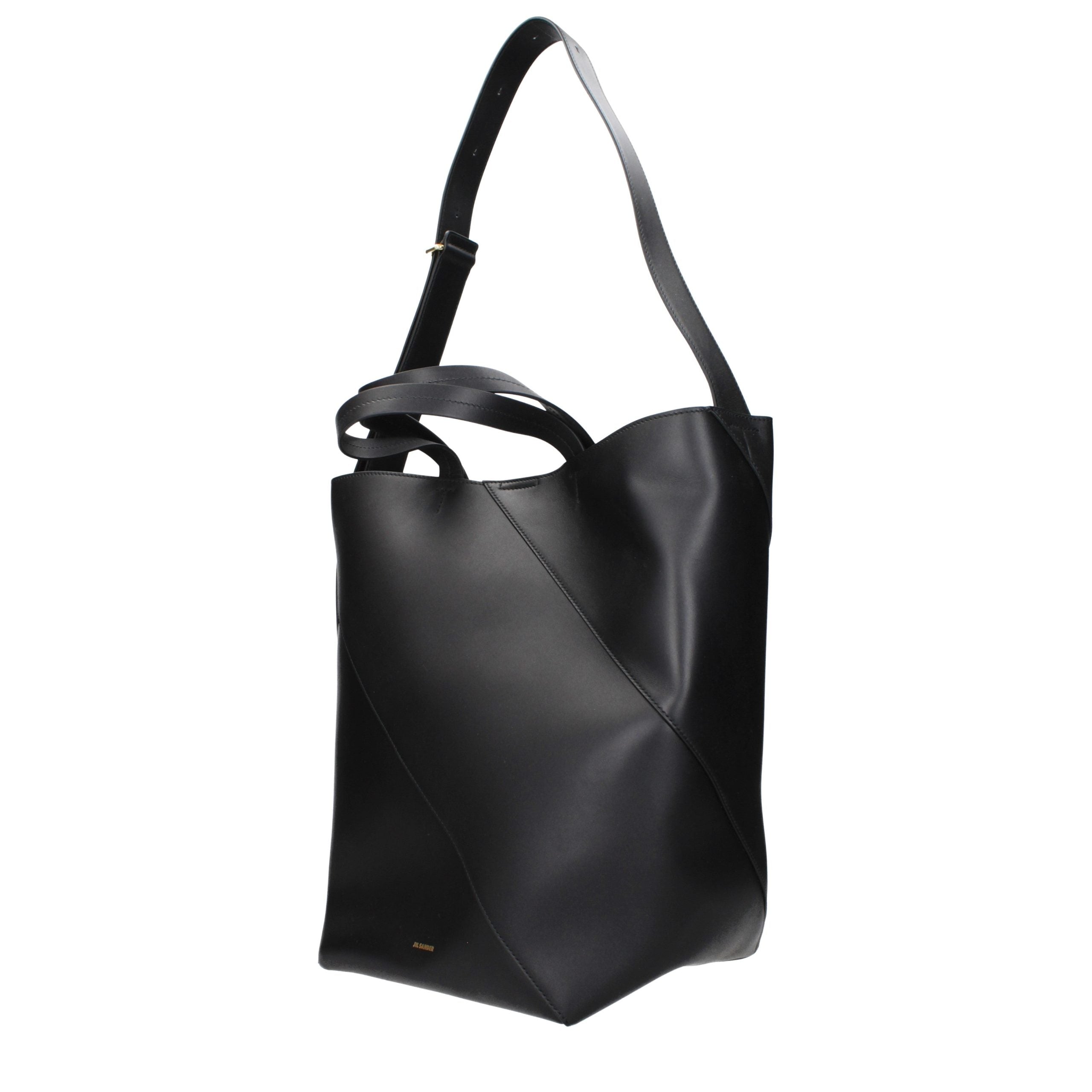 Indulge in the exquisite Jil Sander Black Leather Crossbody Bag, a masterpiece of craftsmanship that elevates any ensemble with its timeless elegance and luxurious allure.
