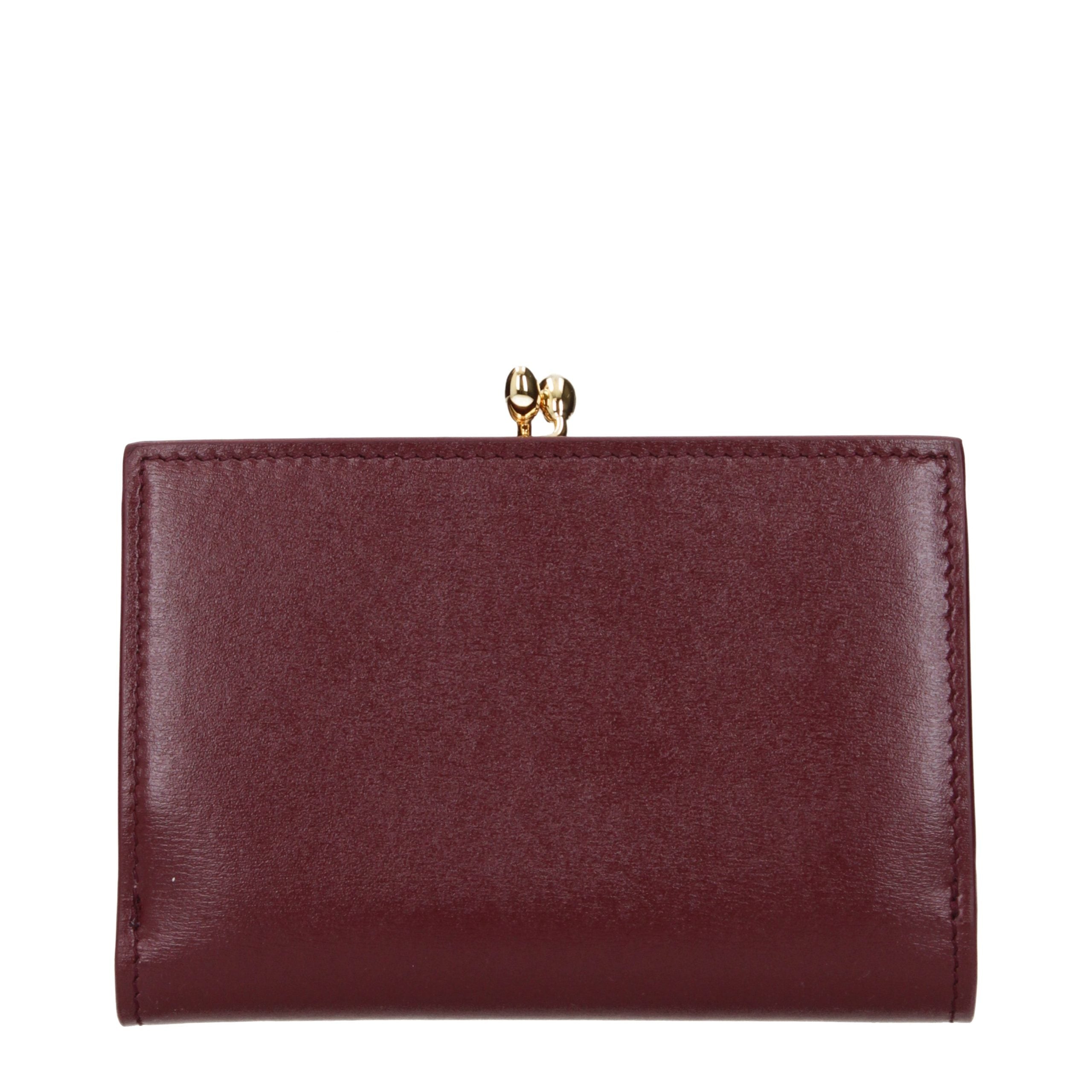 Indulge in the exquisite Jil Sander Red Leather Wallet, a symbol of refined elegance and impeccable craftsmanship, perfect for those who appreciate luxury in every detail.