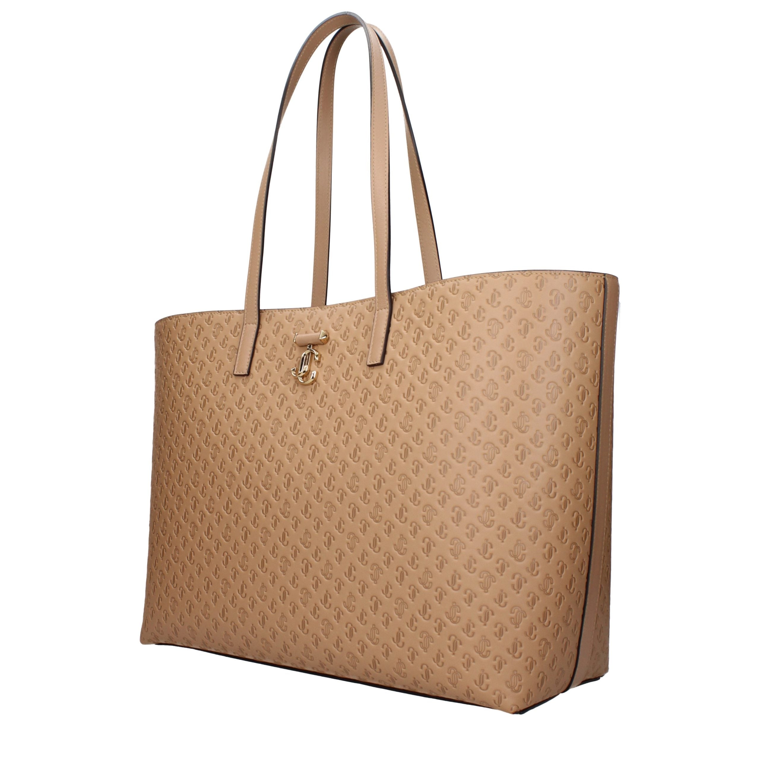 Indulge in the exquisite allure of the Jimmy Choo Brown Leather Shoulder Bag, a symbol of refined elegance and timeless sophistication, perfect for the discerning individual.