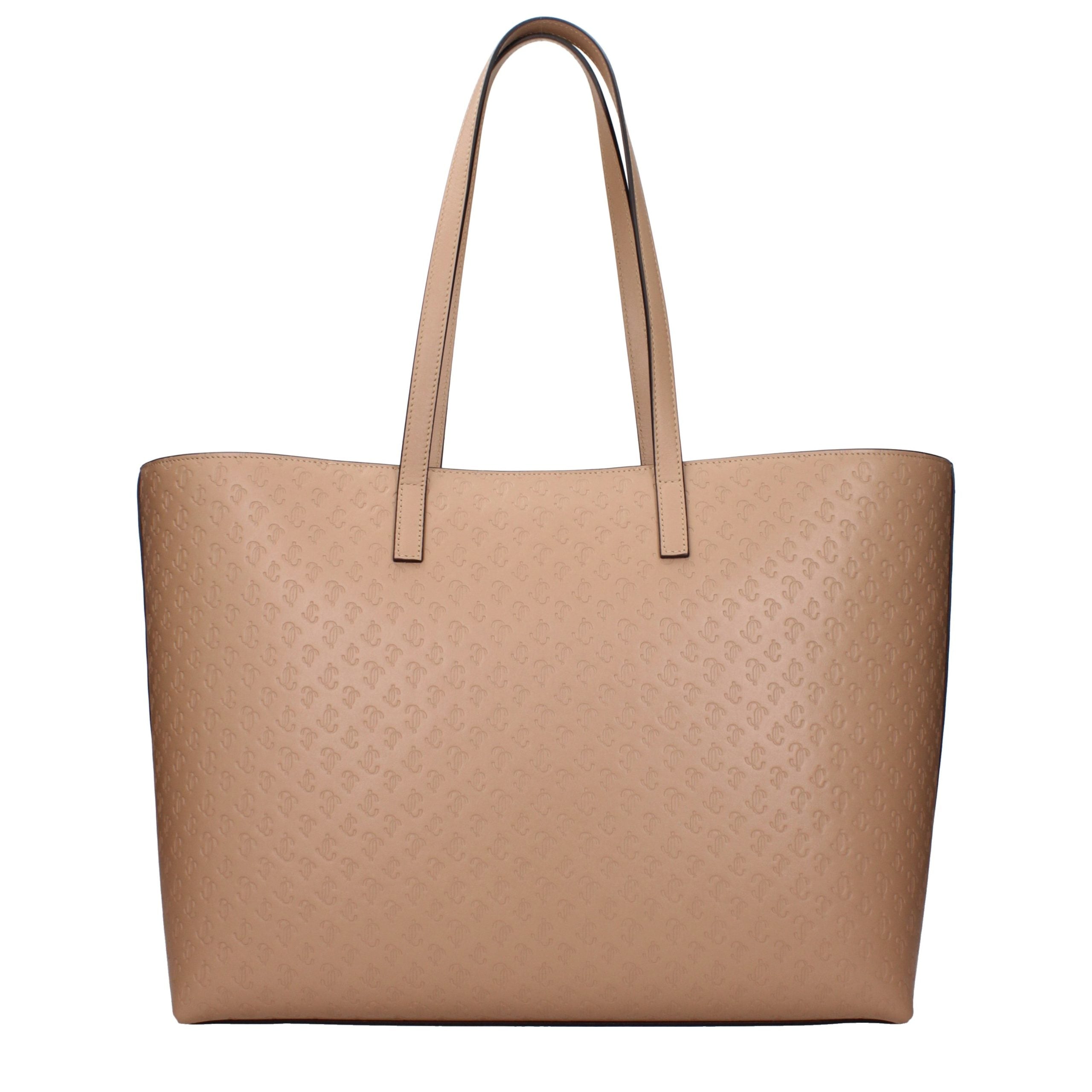 Indulge in the exquisite elegance of the Jimmy Choo Brown Leather Shoulder Bag, a statement of luxury and sophistication that elevates any ensemble.