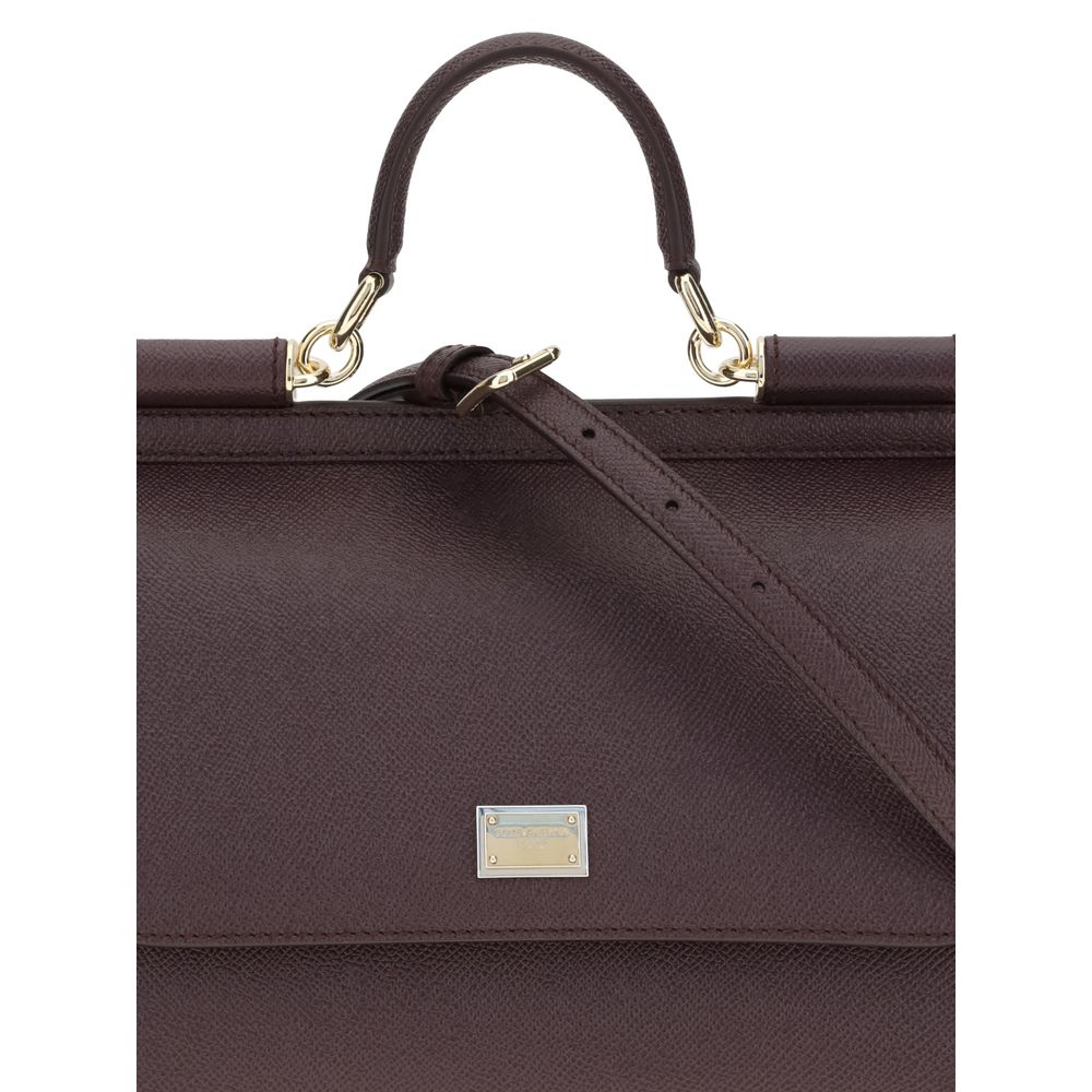 Indulge in the timeless elegance of the Dolce & Gabbana Bordeaux Calf Leather Bos Taurus Handbag, a masterpiece of sophistication and style, perfect for discerning tastes.