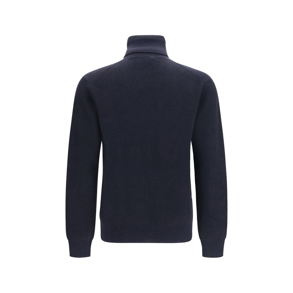 Indulge in the exquisite Brioni Blue Cashmere Turtleneck, crafted from luxurious cashmere and wool, embodying sophistication and timeless elegance for the discerning individual.