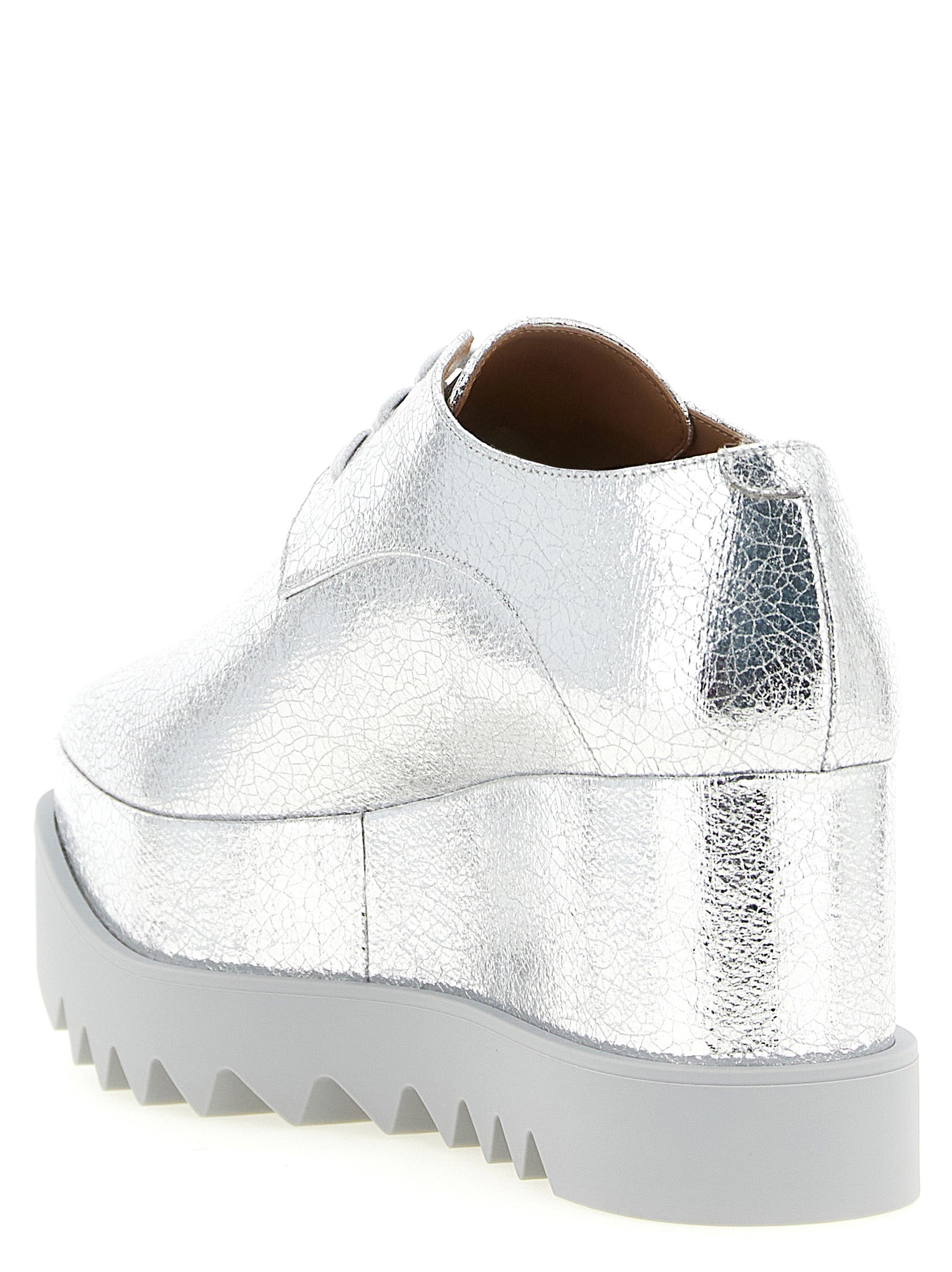 Stella McCartney Silver EVA Flats - Elevate Your Luxe Style