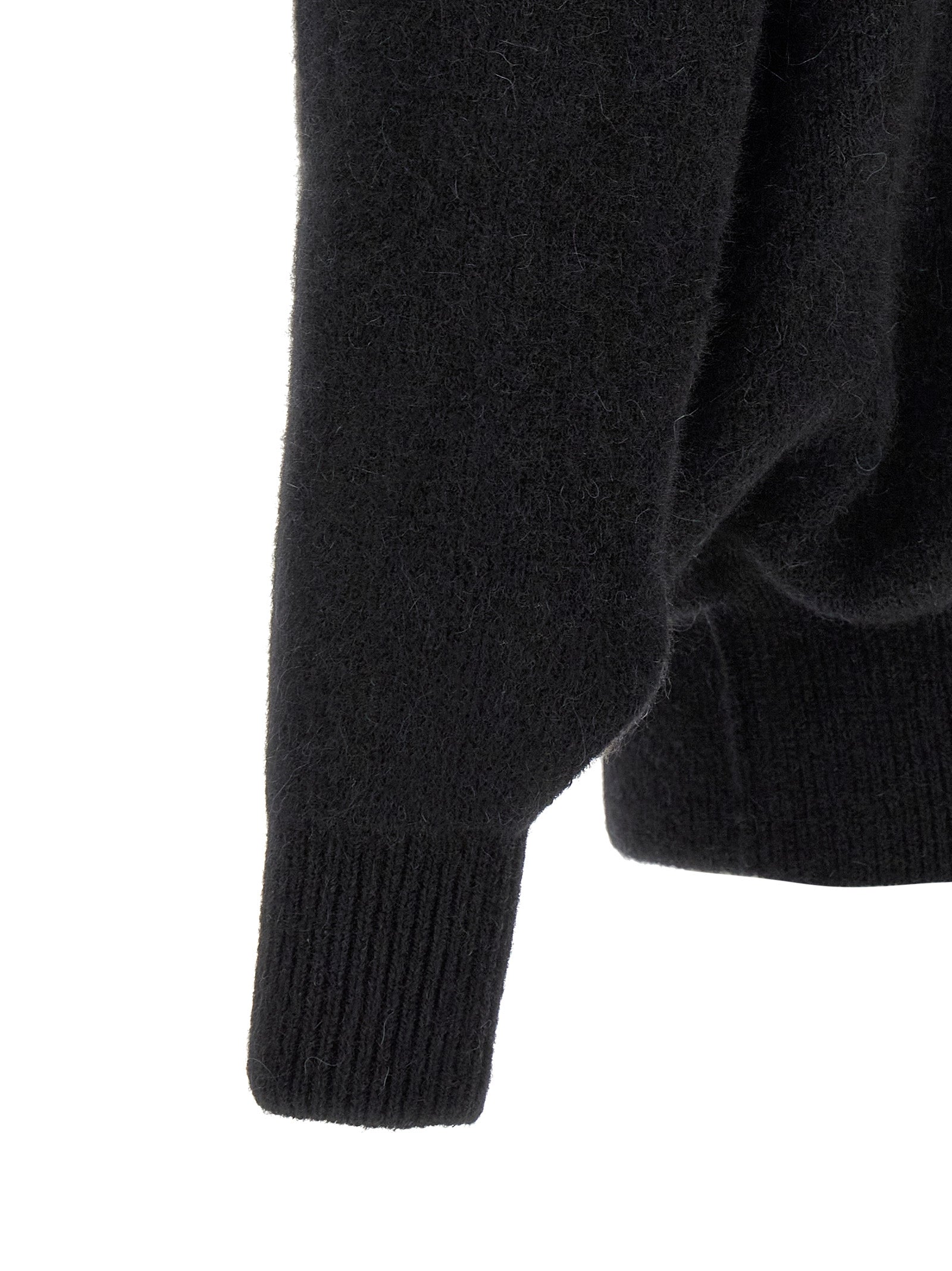 Discover the Rick Owens Black Marabou Sweatshirt, a luxurious blend of alpaca and wool, embodying avant-garde elegance and timeless sophistication for the discerning individual.