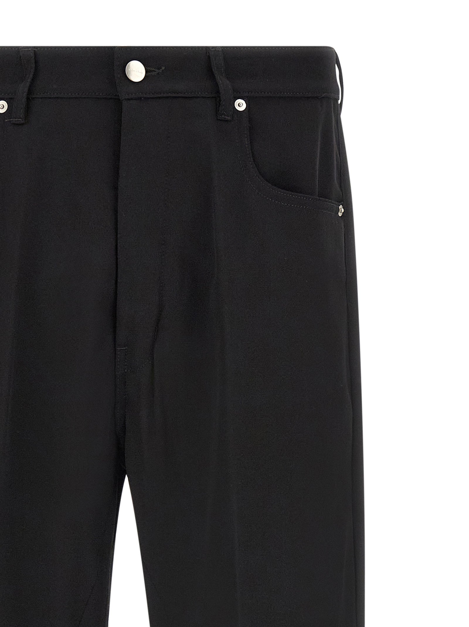 Experience the epitome of luxury with Rick Owens Black Cotton Relaxed Fit Jeans, where avant-garde design meets timeless elegance, perfect for the discerning individual.