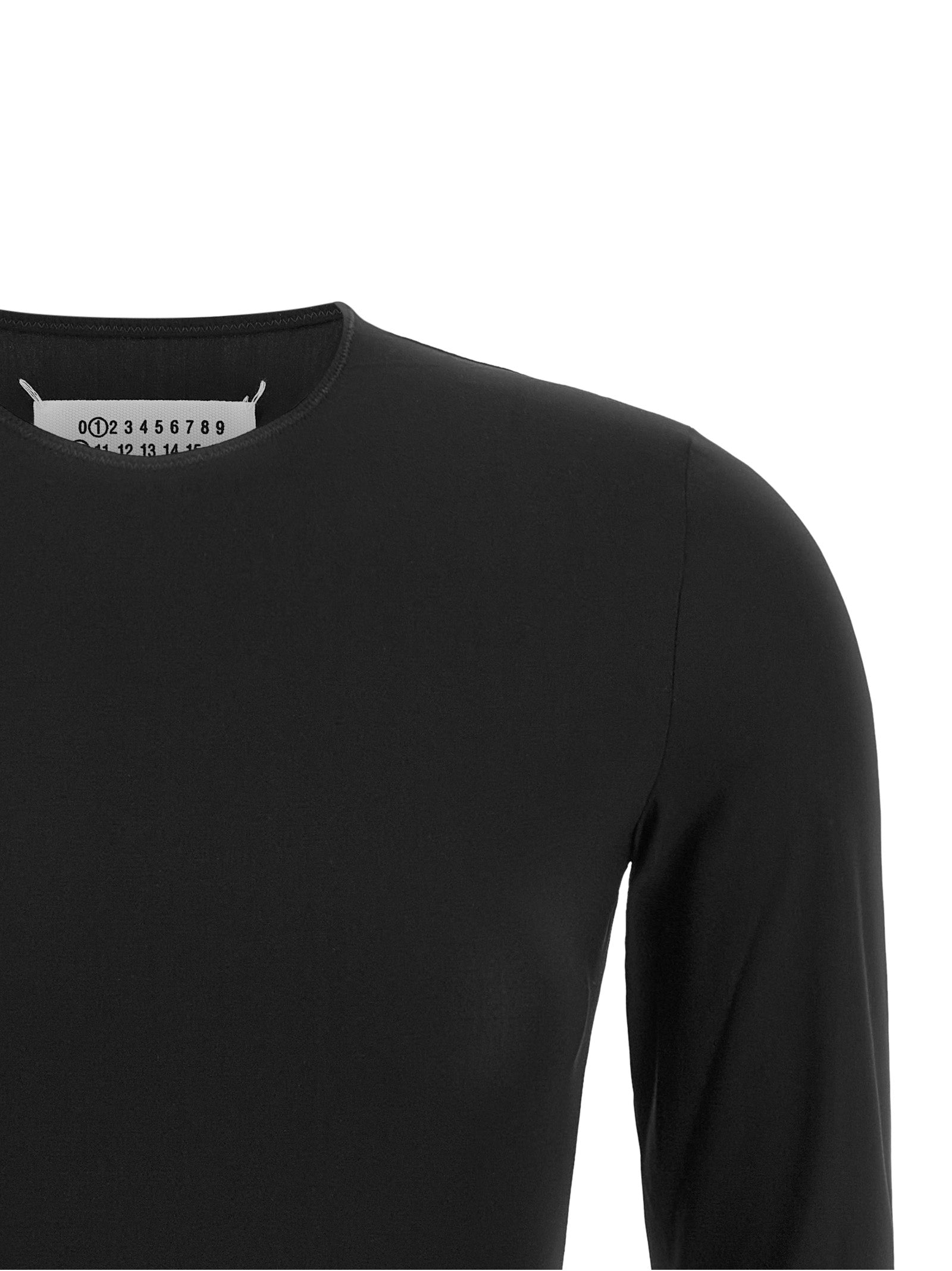 Discover the Maison Margiela Black Polyamide Bodysuit, a seamless blend of luxury and comfort, crafted in Italy for those who embrace elegance and sophistication.