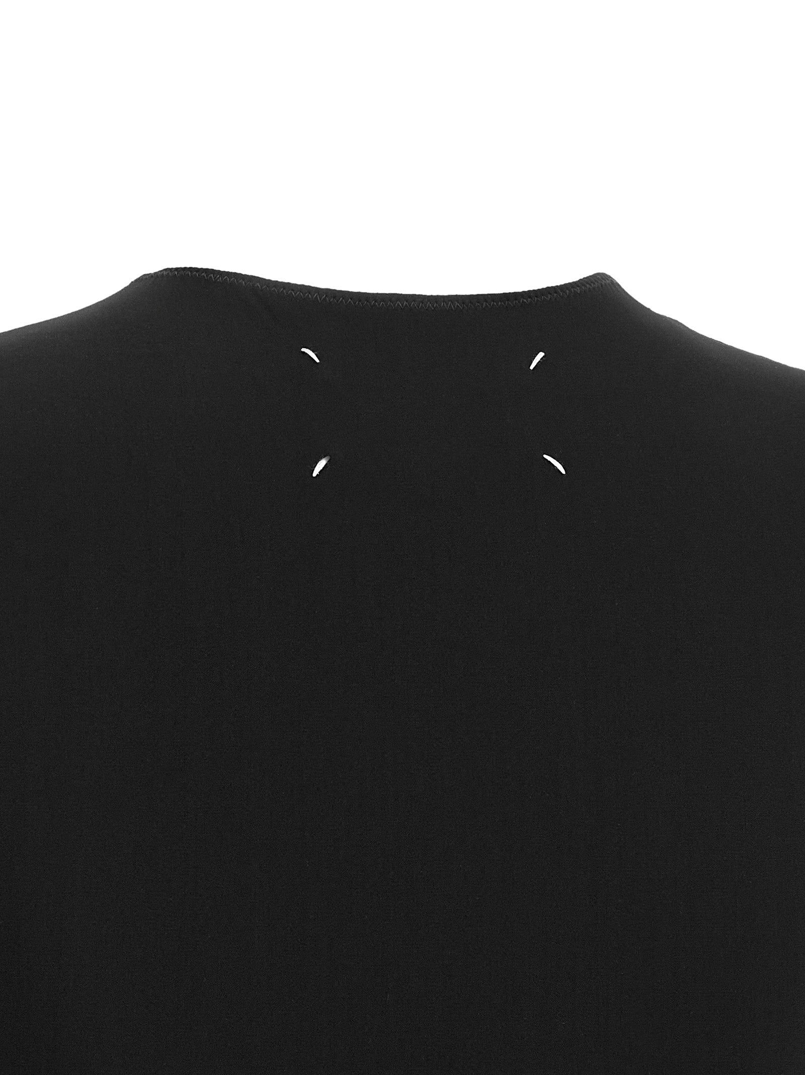 Indulge in the Maison Margiela Black Polyamide Bodysuit, where luxurious craftsmanship meets avant-garde design, perfect for elevating any sophisticated wardrobe.