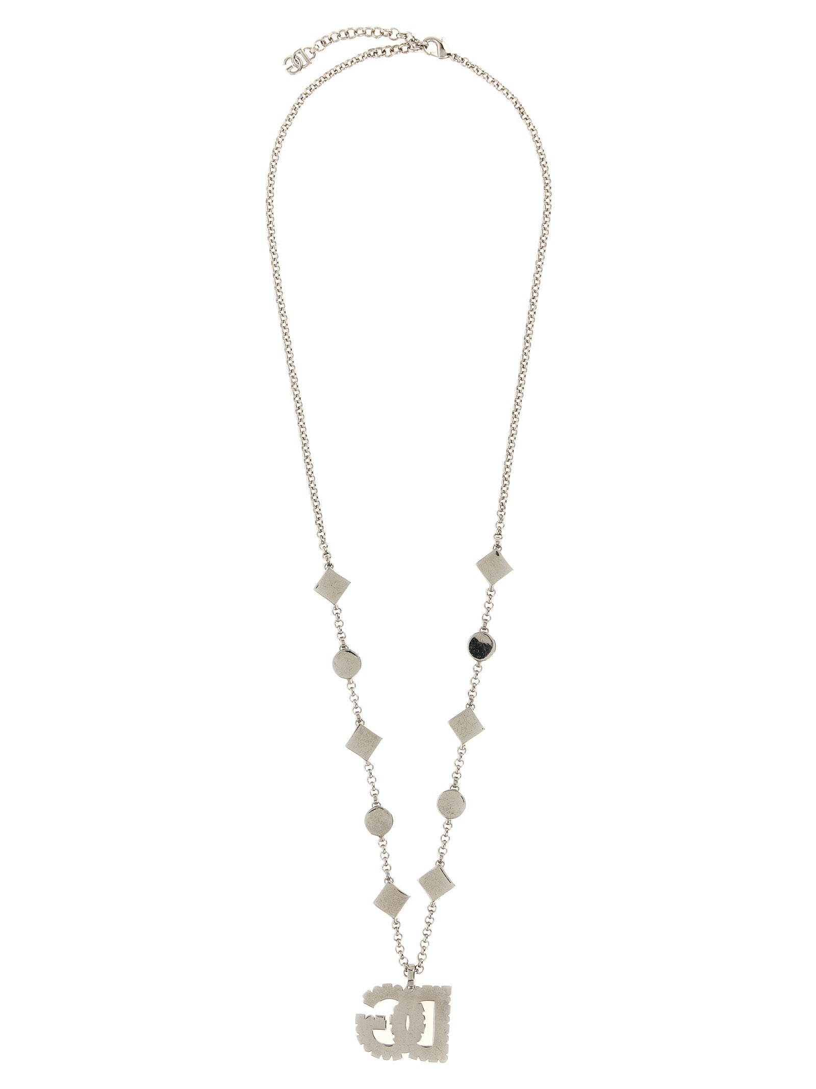 Discover the Dolce & Gabbana Silver Brass Necklace, a masterpiece of Italian craftsmanship adorned with shimmering stones, perfect for elevating any ensemble with timeless elegance.