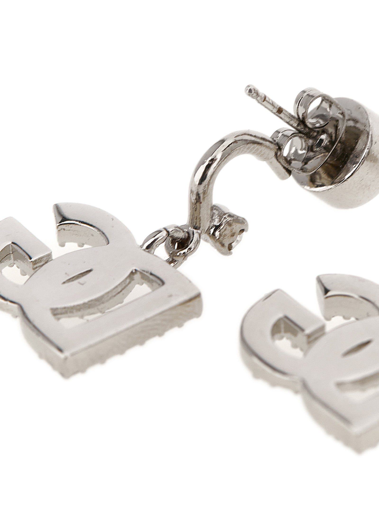 Discover the exquisite Dolce & Gabbana Silver Brass Earrings, a luxurious statement piece crafted in Italy, adorned with shimmering crystals for timeless elegance.