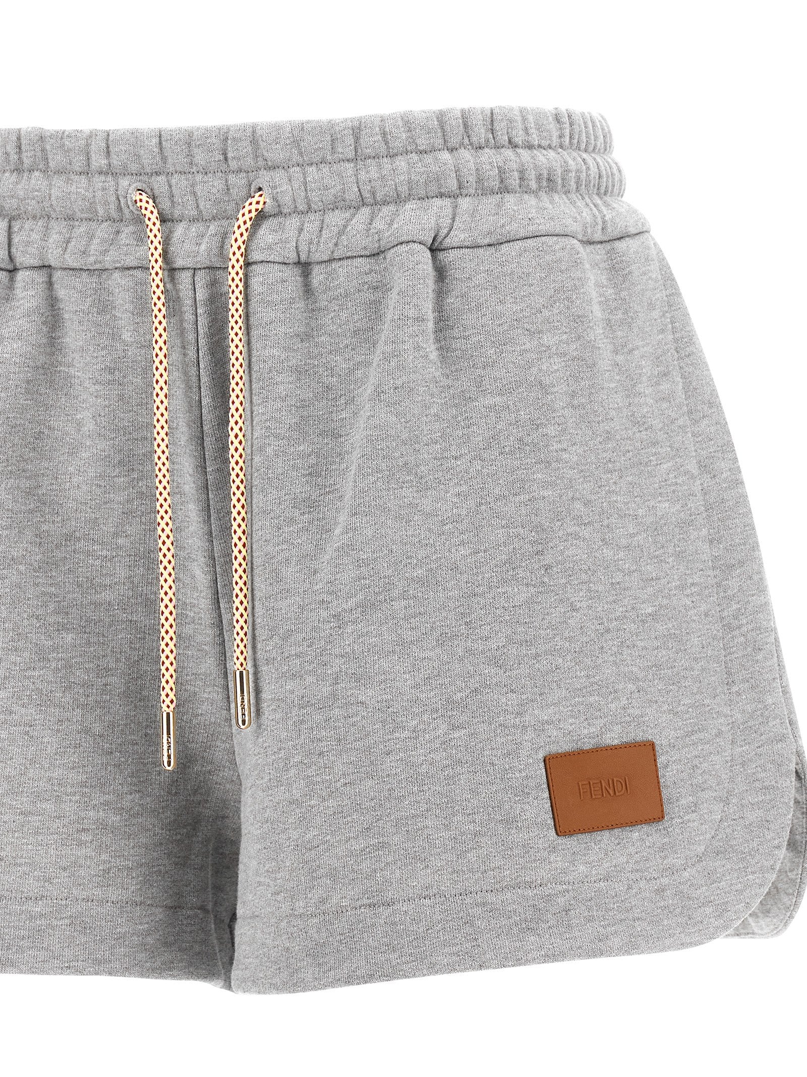 Experience the elegance of Fendi Gray Cotton Bermuda Shorts, where luxurious craftsmanship meets effortless style, perfect for the discerning individual.