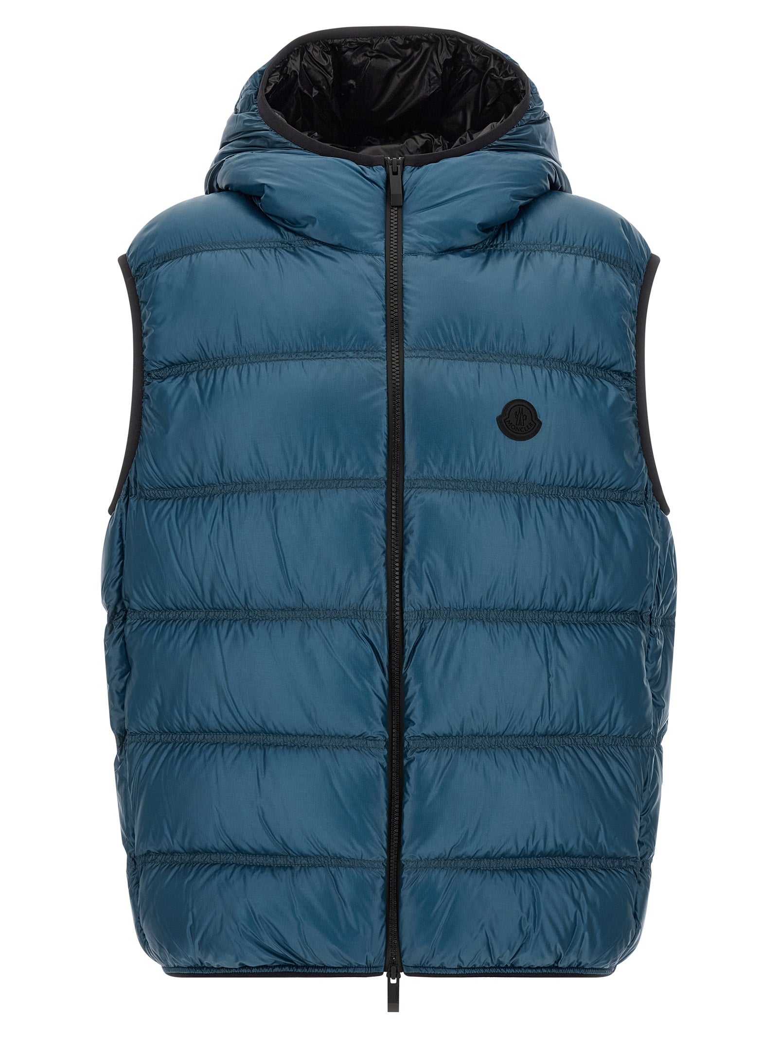 Discover the Moncler Blue Polyamide Full-Length Jacket, a masterpiece of feather-padded luxury crafted from high-performance micro ripstop fabric, merging elegance with functionality.