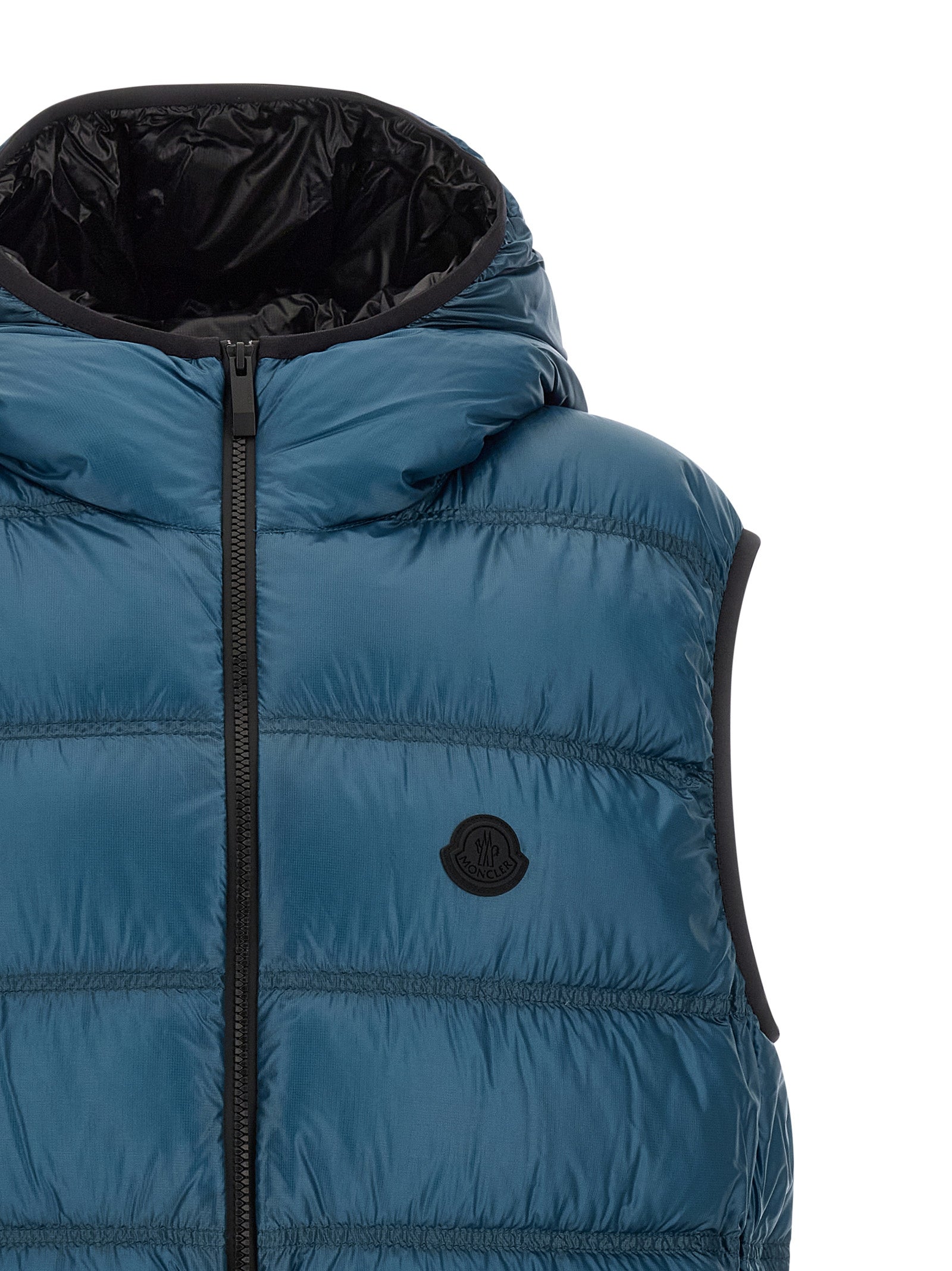 Elevate your style with the Moncler Blue Polyamide Full-Length Jacket, a masterpiece of luxury craftsmanship that seamlessly blends functionality and elegance.