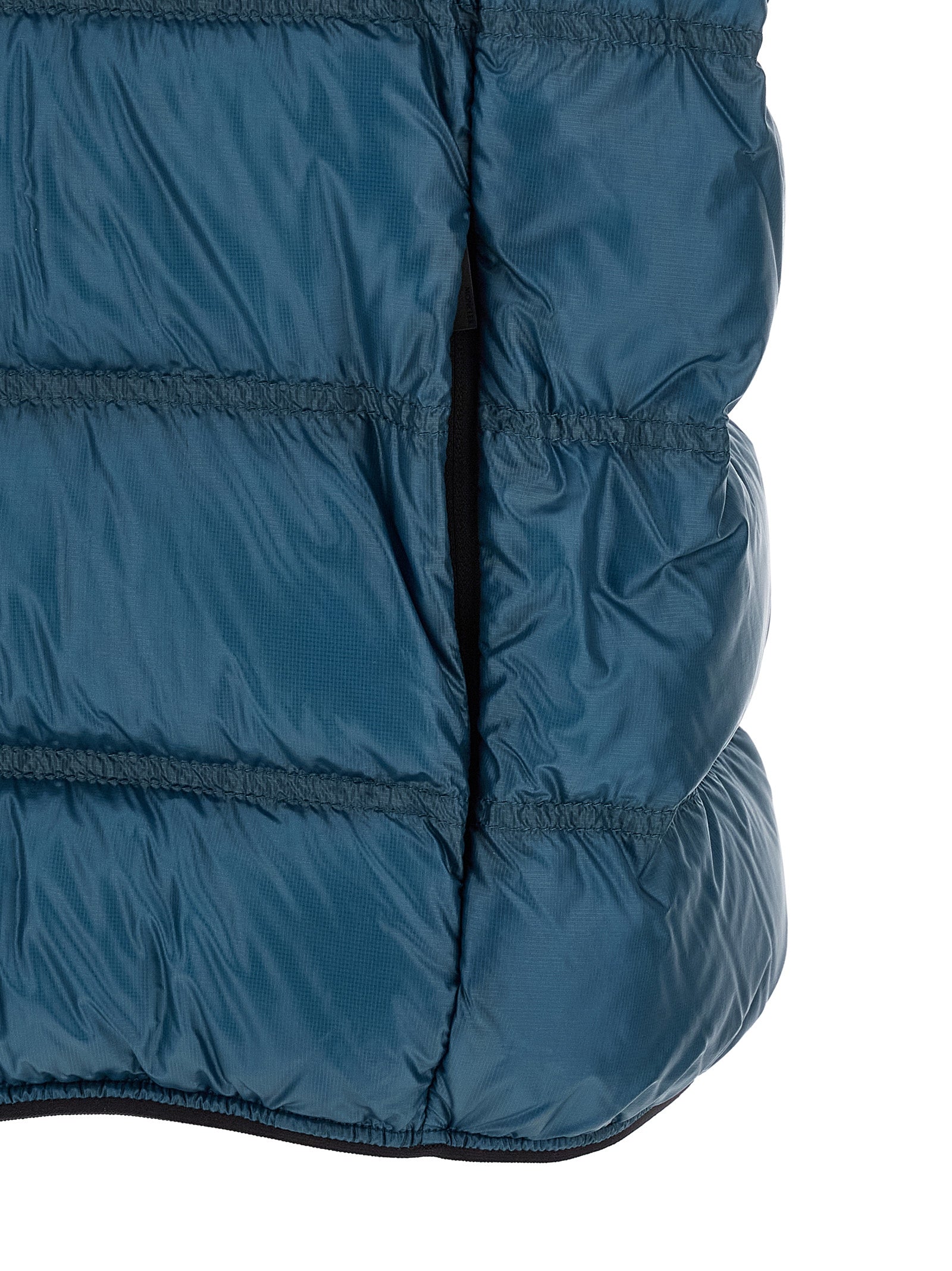 Discover the Moncler Blue Polyamide Full-Length Jacket, a masterpiece of feather-padded elegance and high-performance fabric, embodying luxury and sophistication.