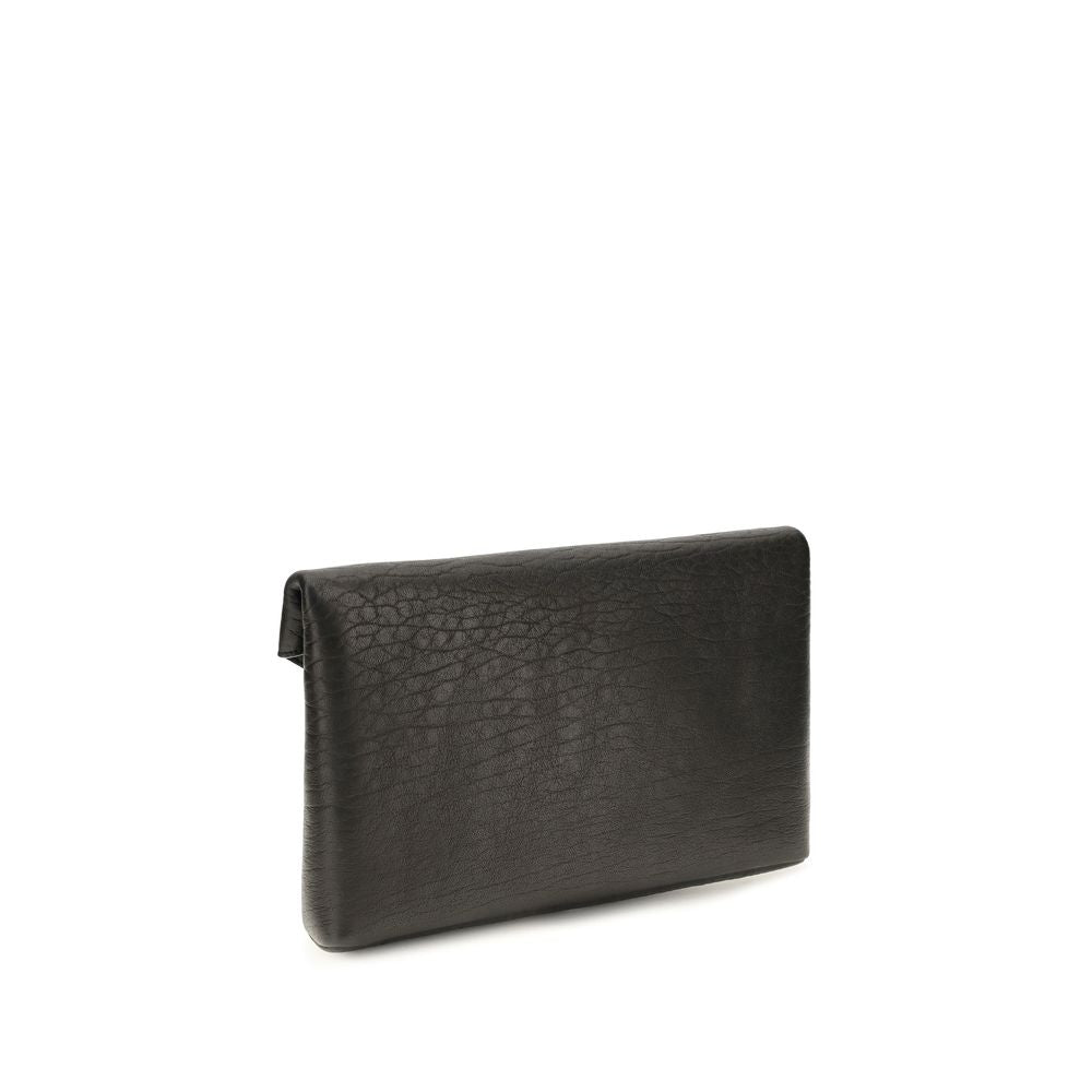 Indulge in the exquisite Saint Laurent Black Lamb Ovis Aries Aries Wallet, a luxurious accessory crafted from premium materials, embodying sophistication and timeless elegance for the discerning individual.