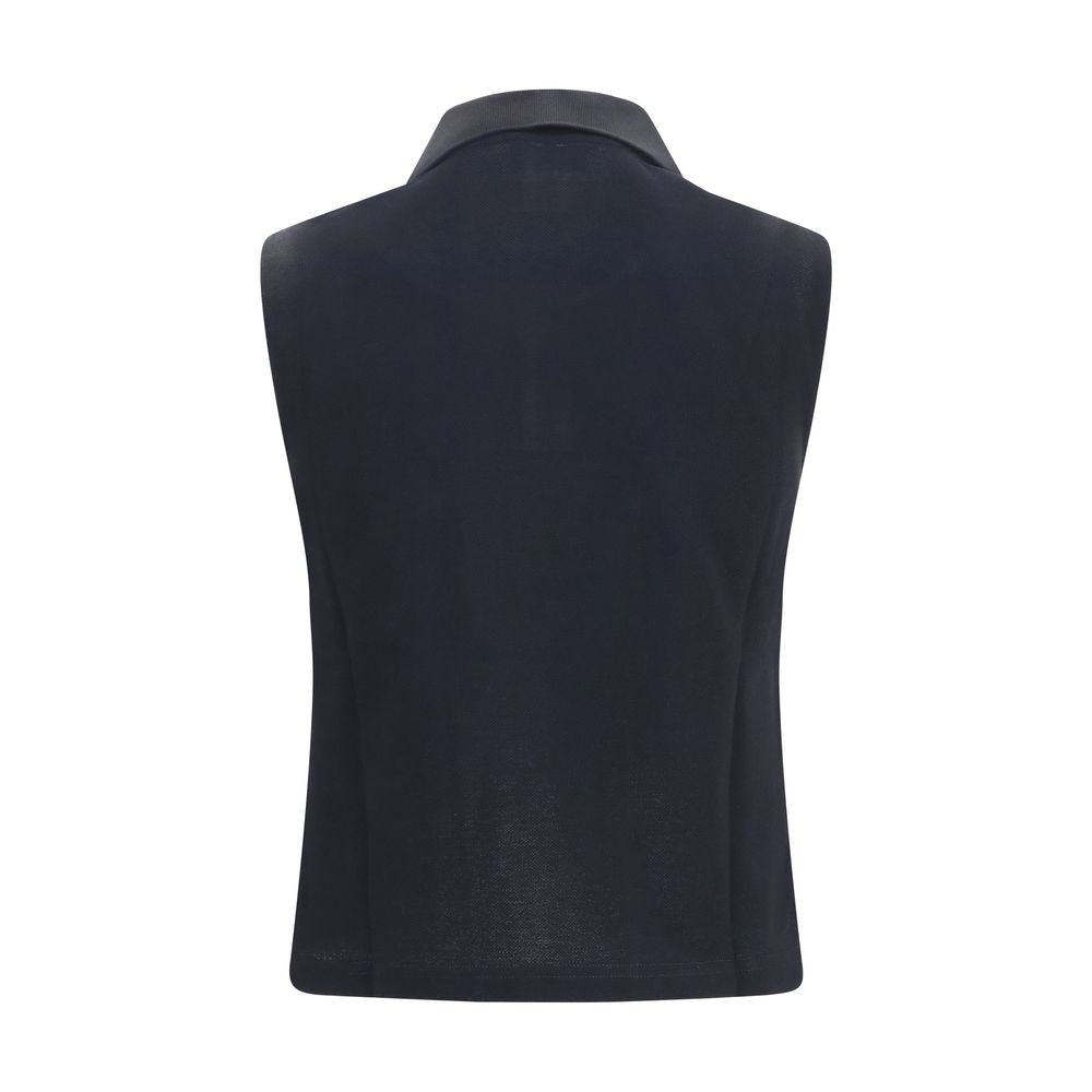 Indulge in the Saint Laurent Black Recycled Cotton Polo Shirt, a masterpiece of sustainable luxury, offering oversized elegance and timeless sophistication for the discerning wardrobe.