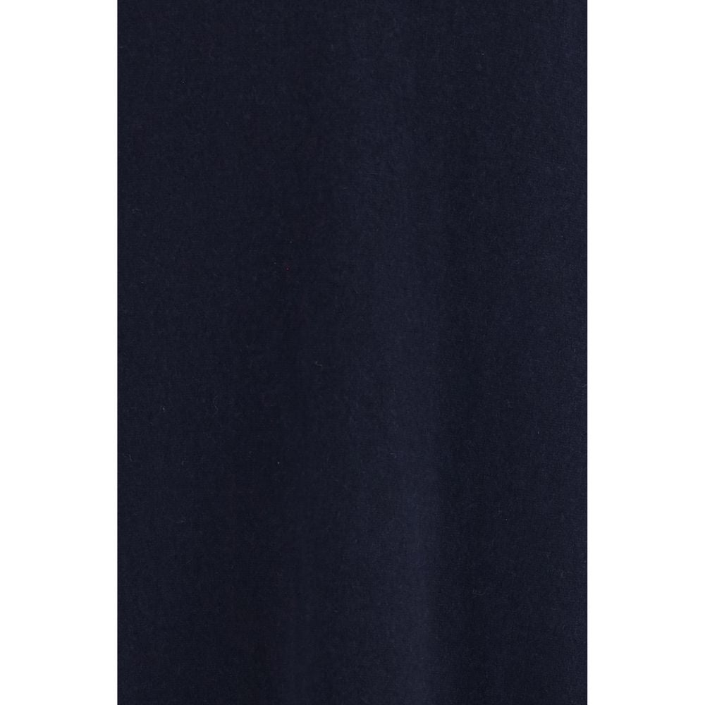Indulge in the Malo Blue Cashmere Casual Dress, a masterpiece of soft cashmere that embodies elegance and sophistication for the discerning individual.