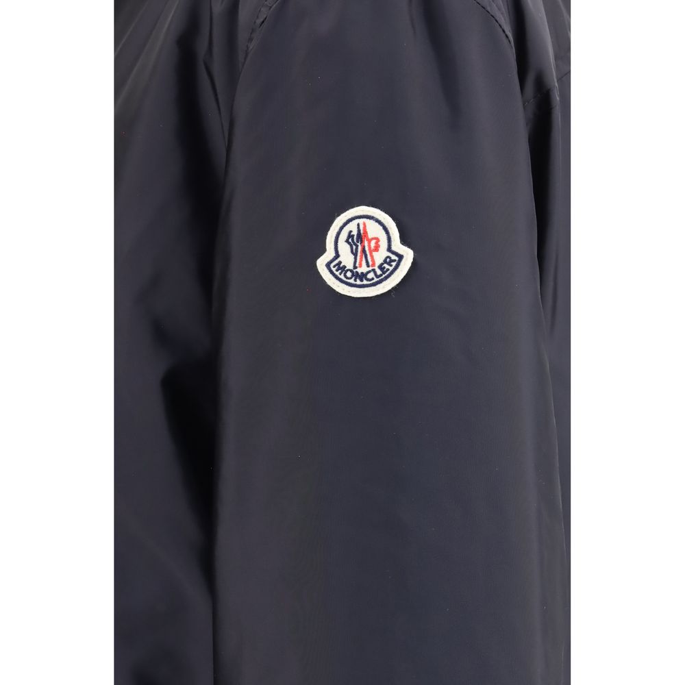 Discover the Moncler Blue Polyamide Shell Jacket, a fusion of recycled technical nylon and plush down filling, epitomizing elegance and sophistication for the discerning individual.