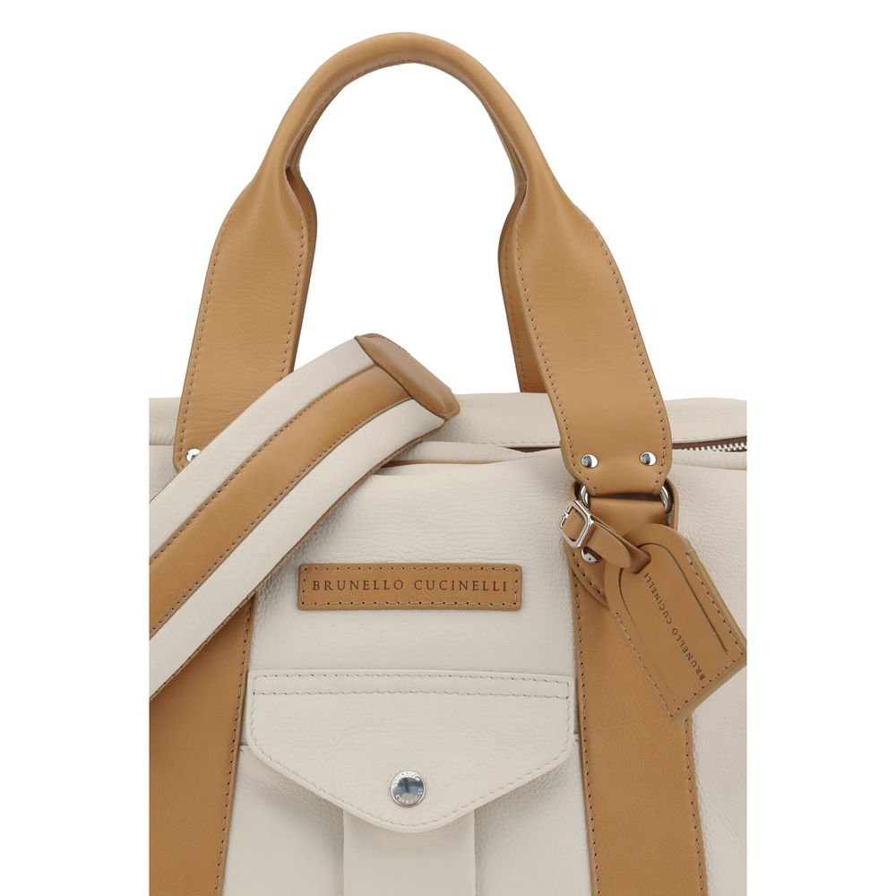 Discover the Brunello Cucinelli Beige Calf Leather Bos Taurus Luggage, a masterpiece of exquisite craftsmanship and timeless elegance, perfect for discerning travelers.