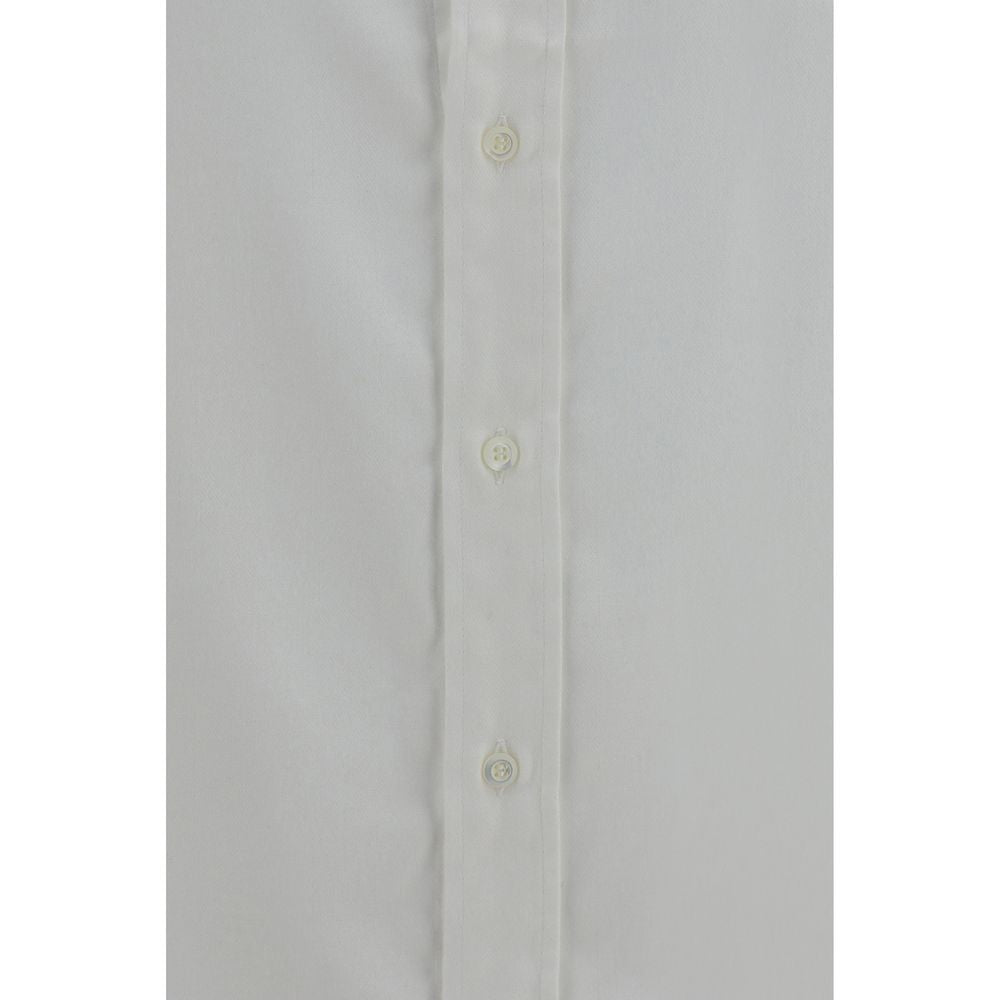 Discover the elegance of Brunello Cucinelli's White Cotton Dress Shirt, crafted from premium materials for a refined look that embodies timeless luxury and sophistication.