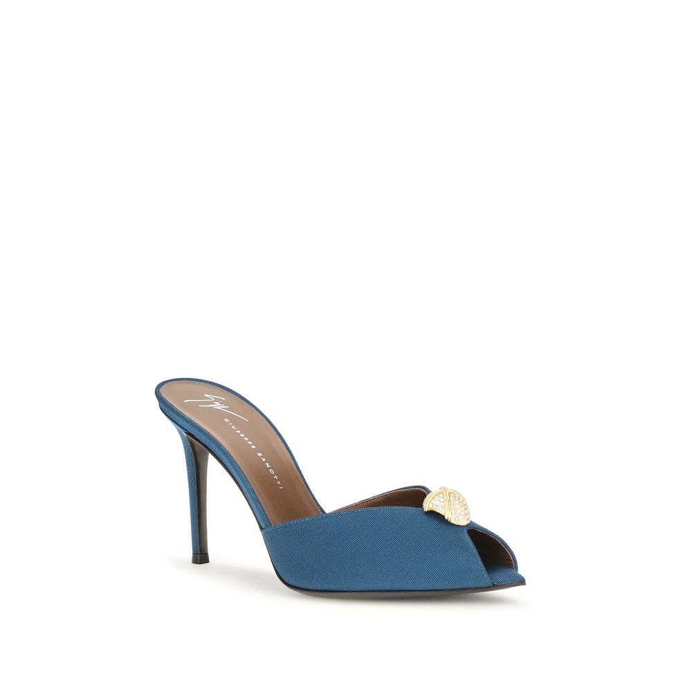 Indulge in the exquisite elegance of Giuseppe Zanotti's Blue Calf Leather Bos Taurus Stiletto Heel Sandals, where sophisticated craftsmanship meets bold luxury for unforgettable evenings.