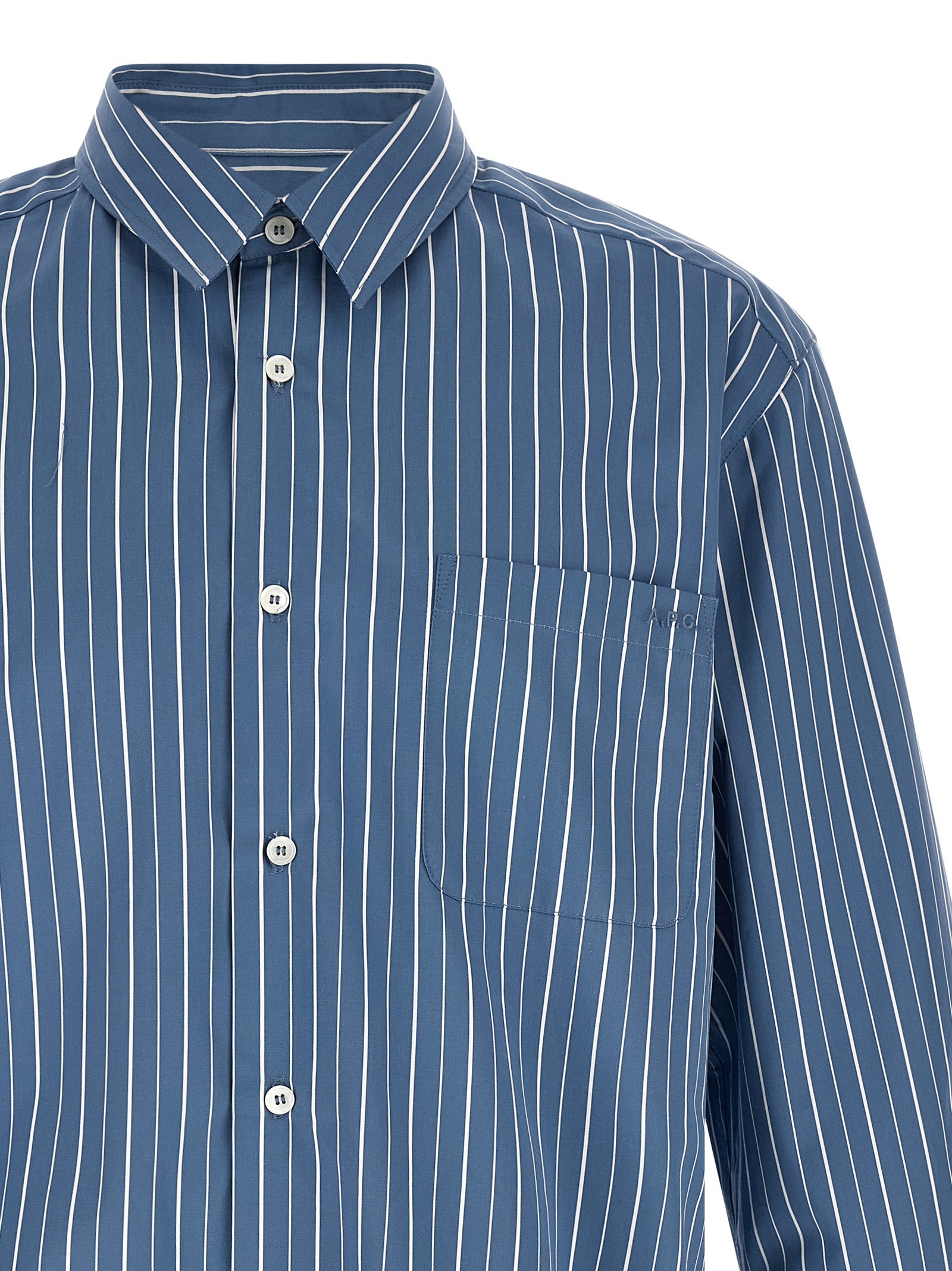 Elevate your wardrobe with the A.P.C. Blue Cotton Blouse, a timeless blend of sophistication and comfort, perfect for those who appreciate exquisite craftsmanship.
