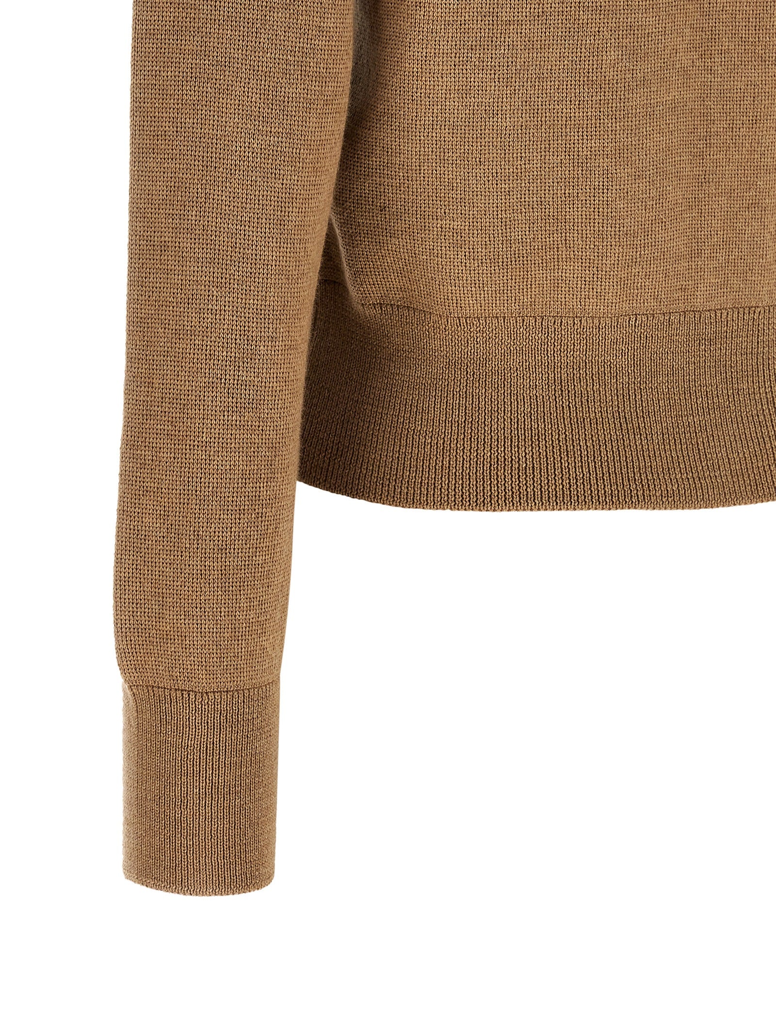 Elevate your wardrobe with the Ami Paris Beige Wool Cardigan, a masterpiece of 100% wool craftsmanship, embodying timeless elegance and Parisian sophistication.