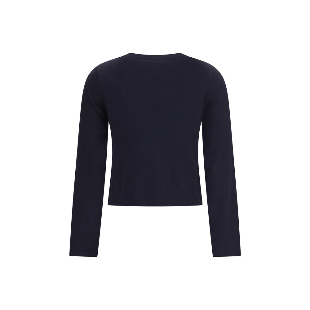 Experience the exquisite allure of the n°451 lisa by Extreme Cashmere, a luxurious cotton-cashmere blend T-shirt that redefines elegance and comfort for every occasion.