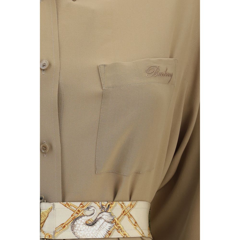 Experience timeless elegance with the Burberry Beige Silk Casual Dress, a masterpiece of luxurious silk that embodies sophistication and modern femininity for any occasion.