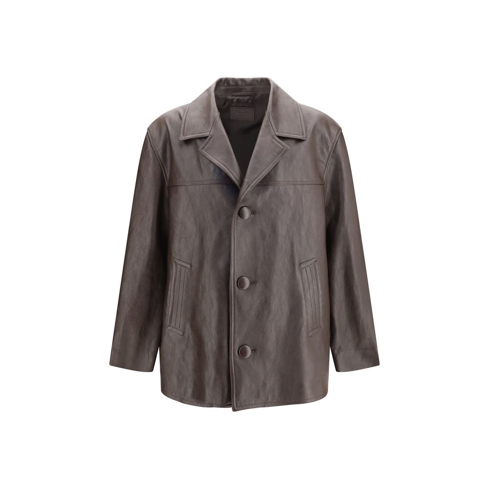 Experience the timeless elegance of the Saint Laurent Black Wool Oves Aries Leather Jacket, crafted from luxurious wool, embodying sophistication and refined style for the discerning individual.