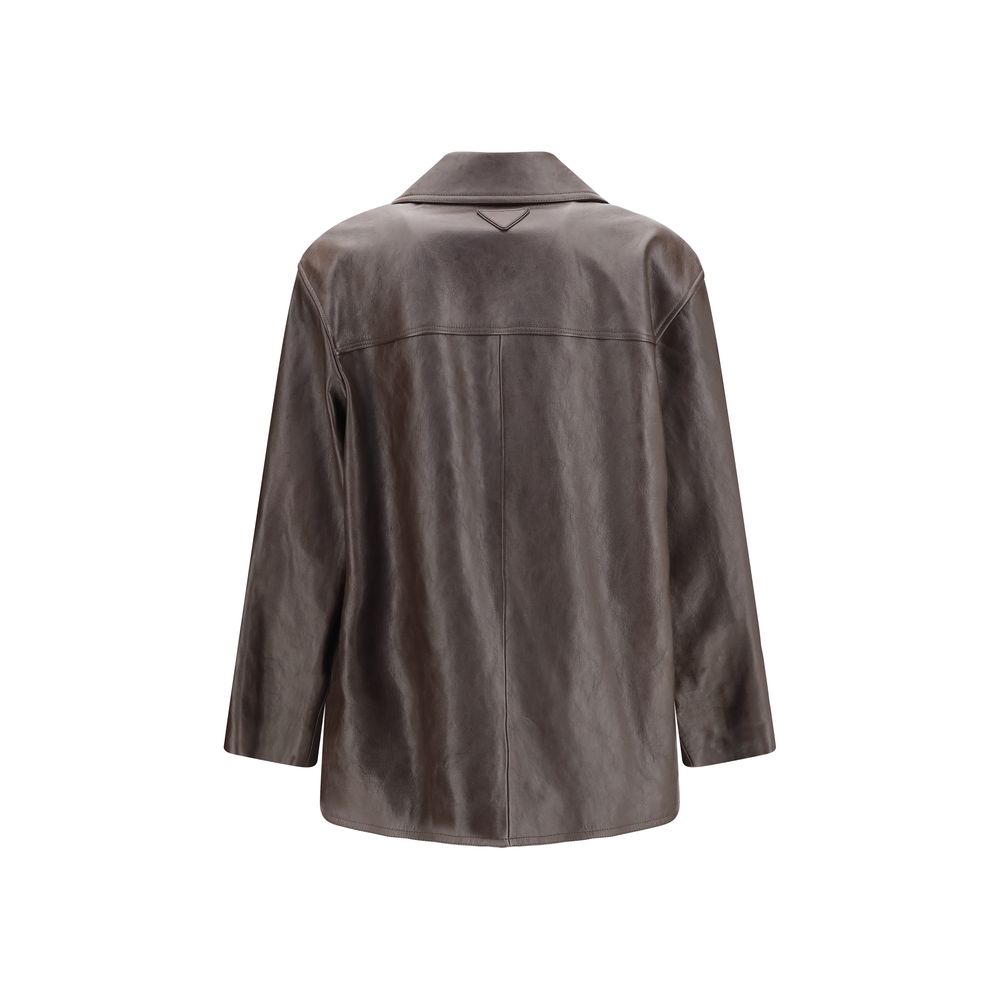 Elevate your wardrobe with the Saint Laurent Black Wool Oves Aries Leather Jacket, a masterpiece of exquisite craftsmanship and timeless elegance, perfect for discerning individuals.